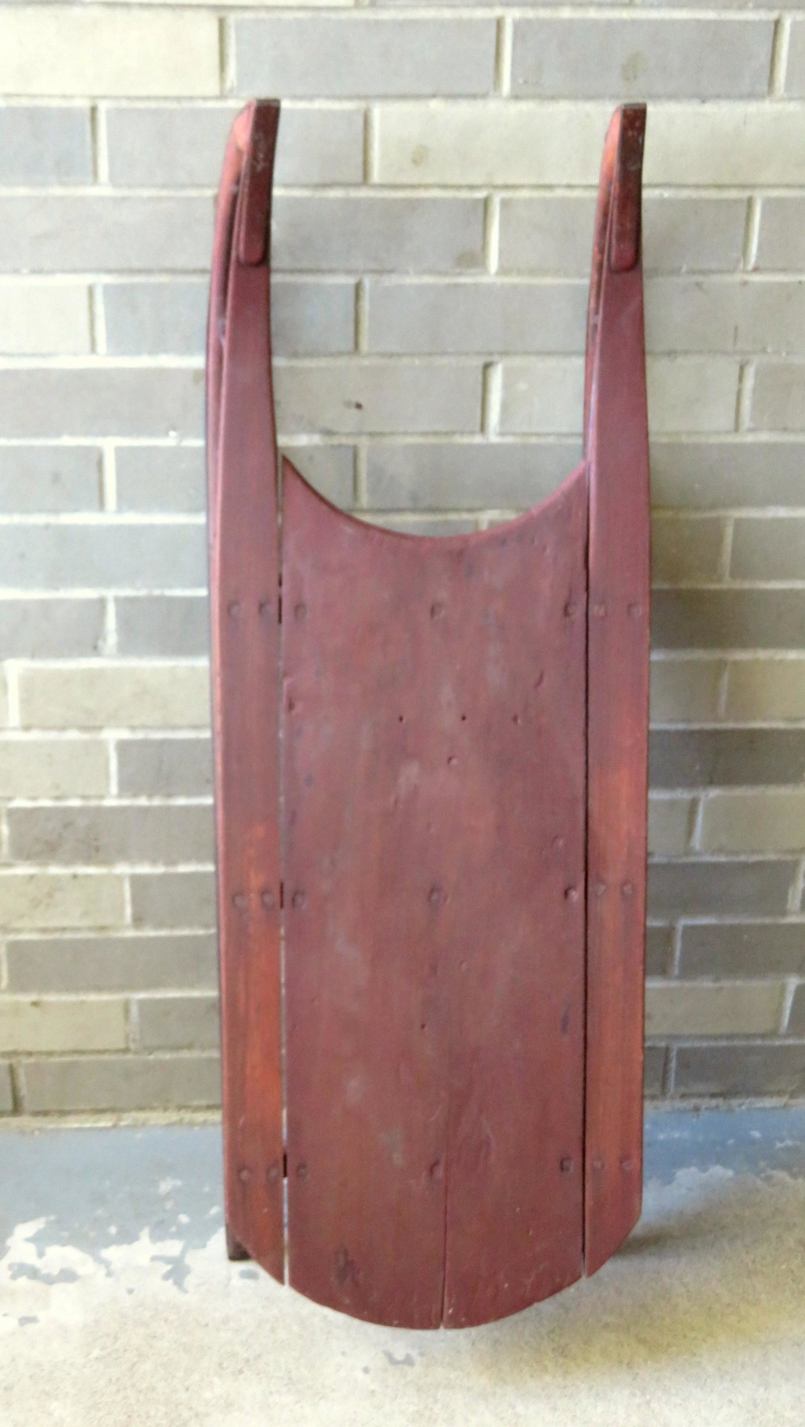 Child's sled, 19th century, in newer red paint in good: Child's sled, 19th century, in newer red paint in good condition - 38"L x 13"W x 12"H.