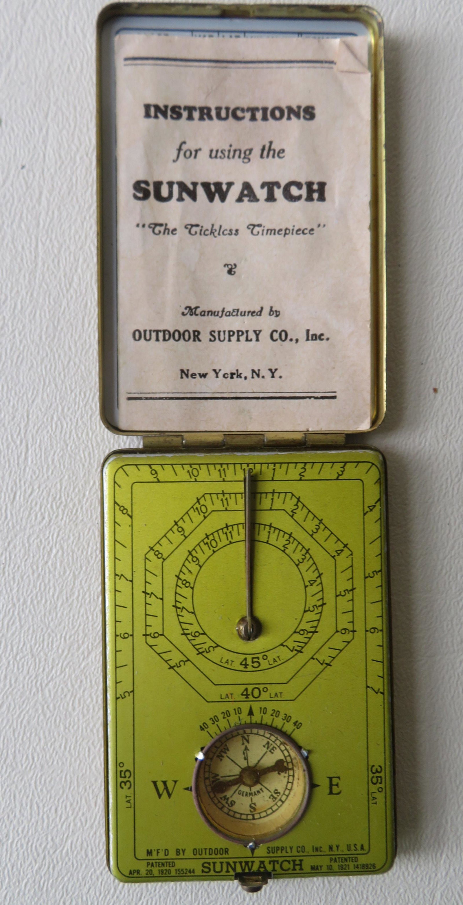 A vintage "Sunwatch" (pocket sundial) made by the: A vintage "Sunwatch" (pocket sundial) made by the Outdoor Supply Company of NY with 1921 patent date. Sold with original paperwork. Good condition. Provenance: From the Stanley Blum estate, Rhinebeck 