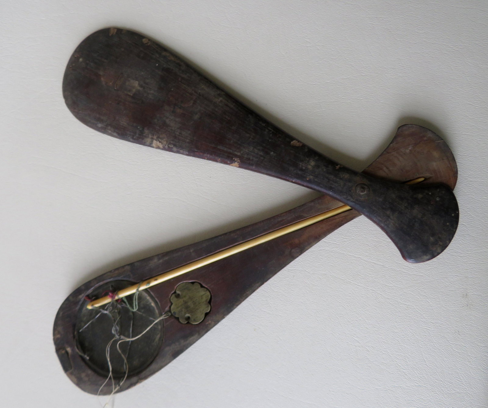 A Chinese opium scale with original beam and weight in: A Chinese opium scale with original beam and weight in original paddle shaped box, 19th century. 12 1/4"L. Some abrasions to case, but overall good condition.