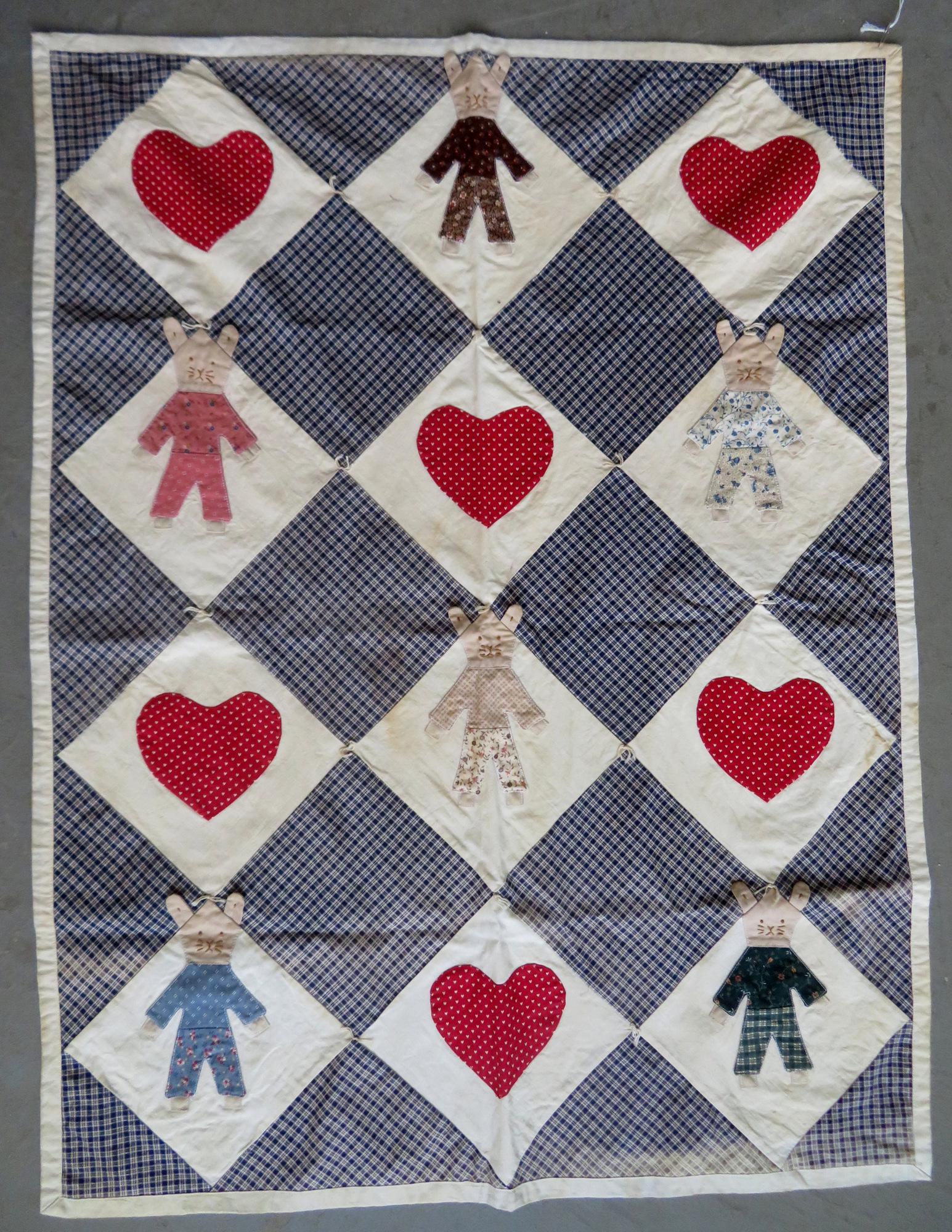 Child's applique crib quilt, decorated with hearts and: Child's applique crib quilt, decorated with hearts and rabbits, machine sewn, early 20th century. Several small areas with sunlight bleaching to fabric, hardly noticeable, but overall very good condit