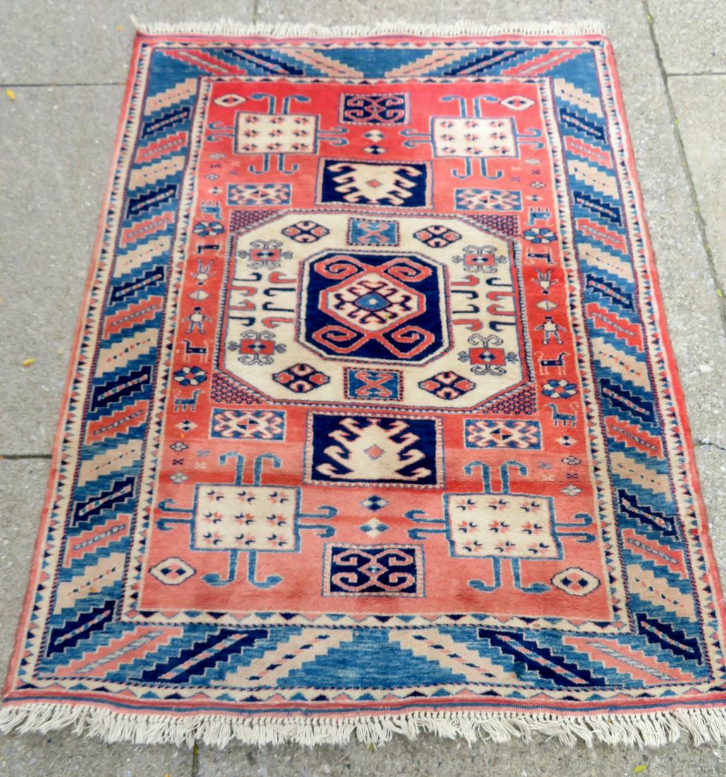 An oriental scatter rug, mid to late 20th century, 4': An oriental scatter rug, mid to late 20th century, 4' 9" x 6' 7" - some fading (see photo), otherwise good pile, no stains, hand knotted and in good condition. Provenance: From the Stanley Blum estate