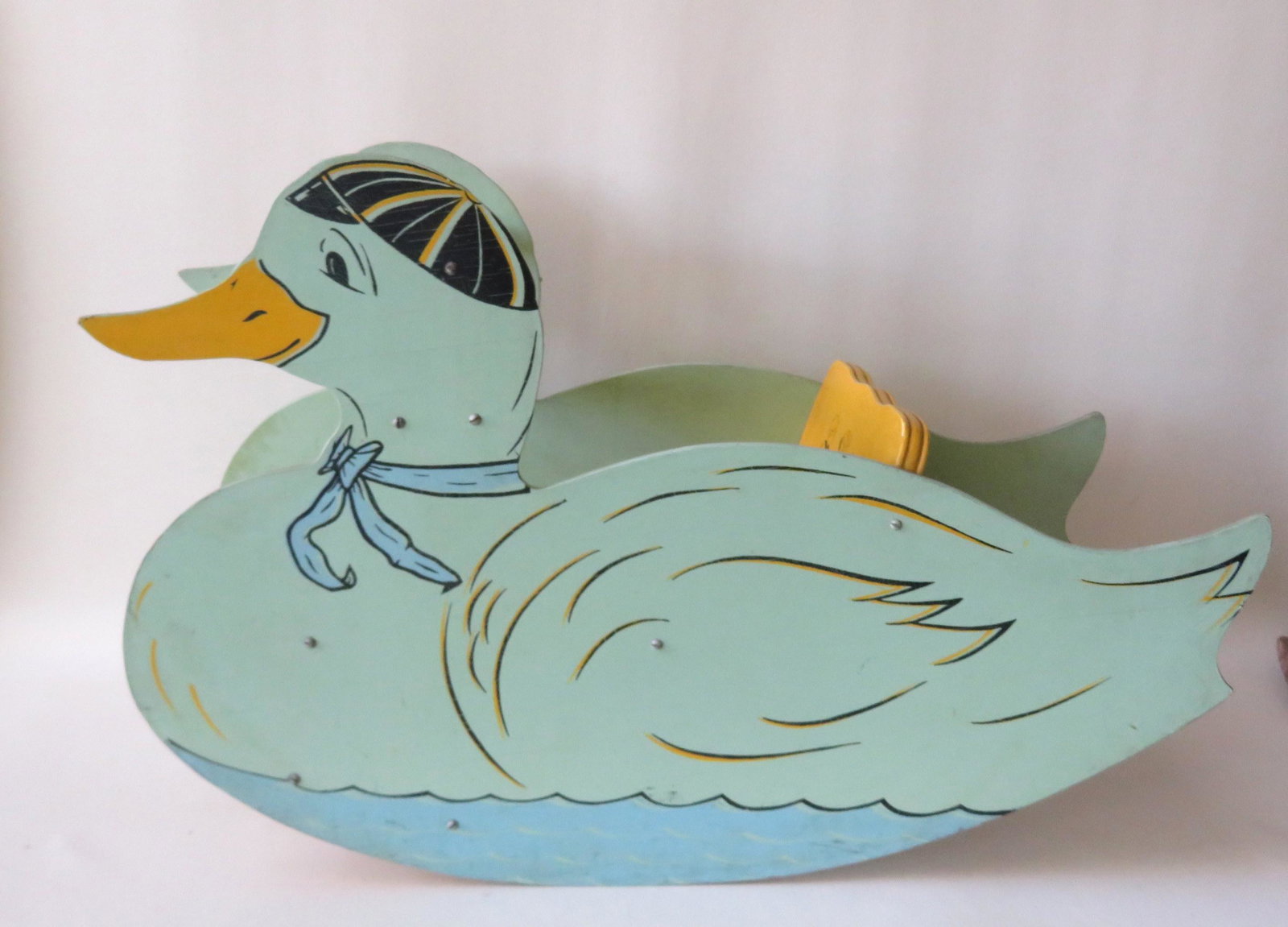 A duck form 1950's hand painted rocking chair. Very: A duck form 1950's hand painted rocking chair. Very good condition. 30"L x 12 1/2"D x 20 1/2"H.