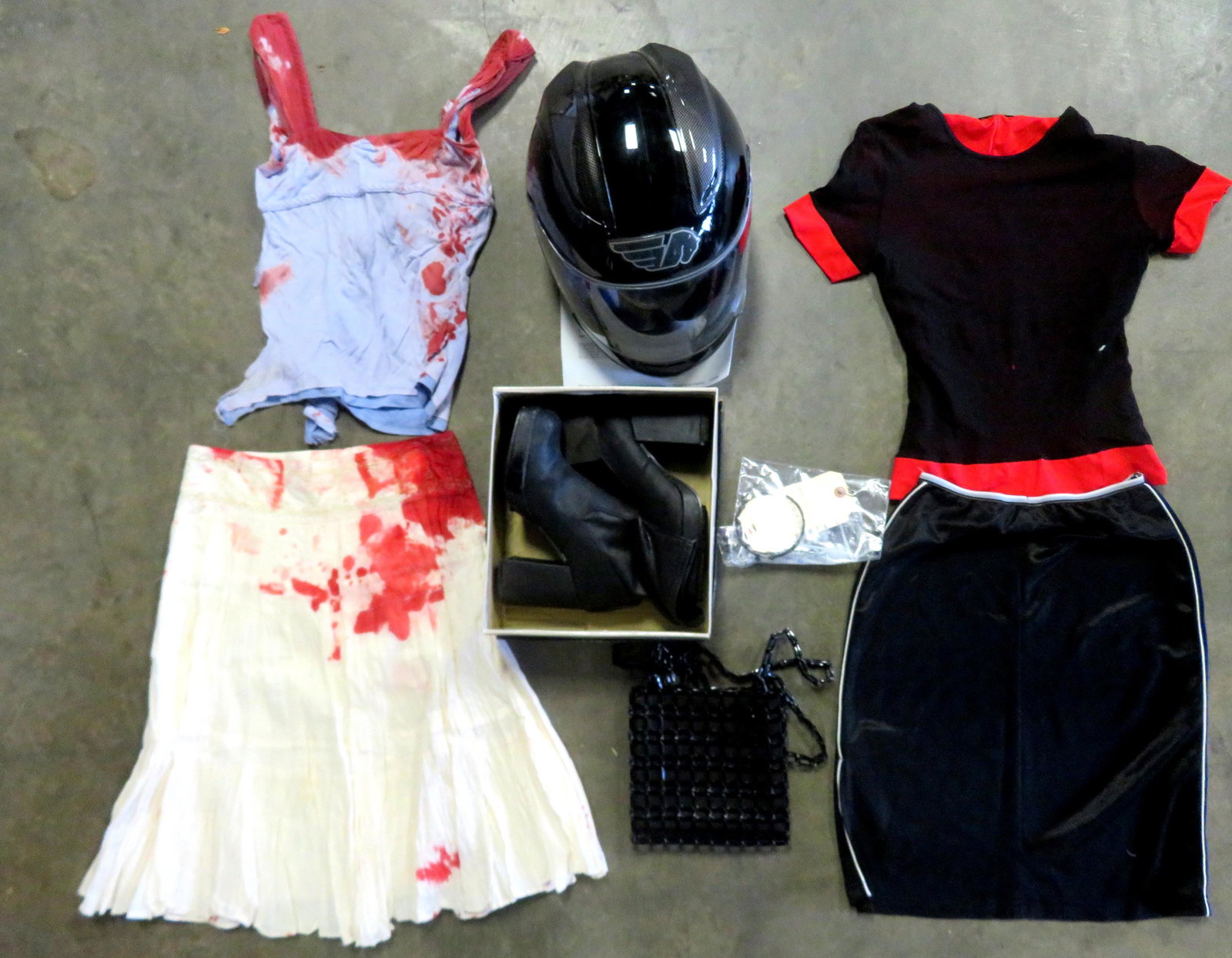 A grouping of Lucy Liu original costumes: A grouping of Lucy Liu original costumes worn during her performances, most with authentication documents from seller. See photos for more details. Together with a plaster cast (mask) of a face, proba