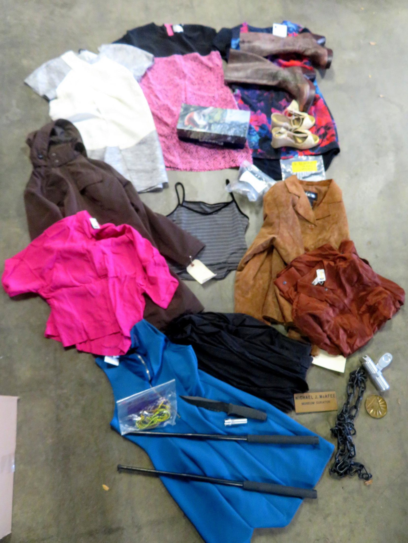 A grouping of Lucy Liu original costumes: A large grouping of Lucy Liu original costumes and accessories worn during her performances, most with authentication documents from original seller - please note that while there are many documents i