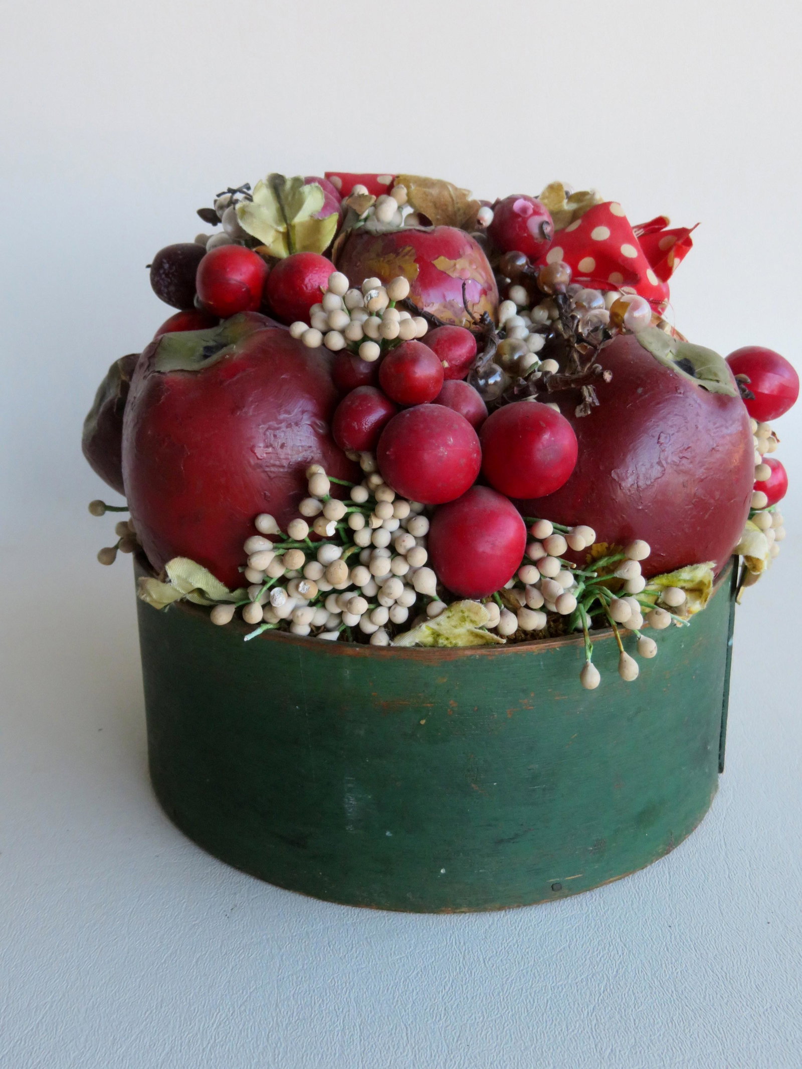 Doris Stauble folk art center piece. Consisting of a: Doris Stauble folk art center piece. Consisting of a grouping of flowers and fruit artistically placed within a 19th century pantry box in original green paint. Doris Stauble, a folk artist from Wisca