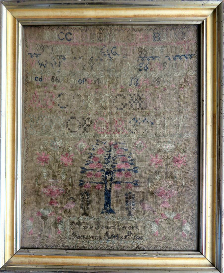 Sampler, alphabet and pictorial, signed "Mary Jones: Sampler, alphabet and pictorial, signed "Mary Jones Work / Aberayron Apr 27th 1826" - decorated with alphabets, large tree, flowers in vases, birds, etc. Condition - darkening of background fabric, th