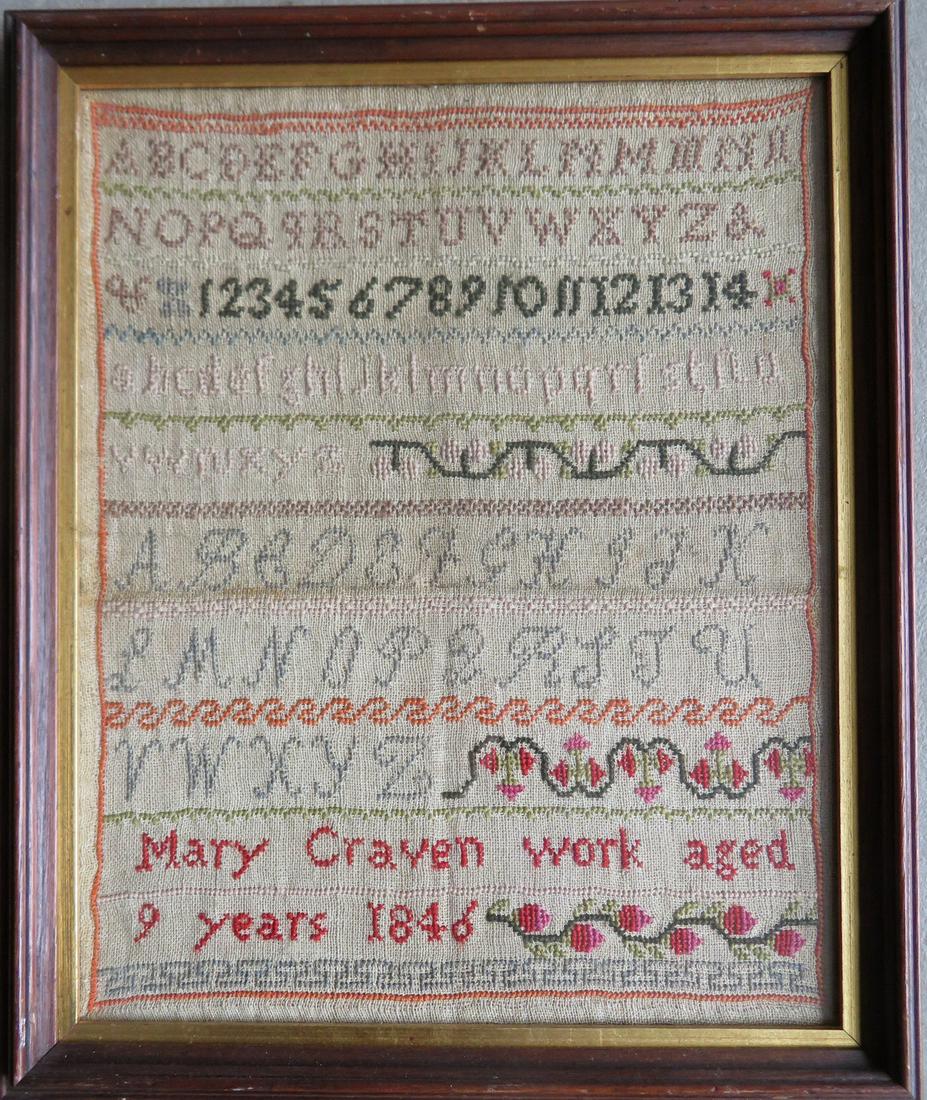 An alphabet sampler signed Mary Craven - aged 9 years -: An alphabet sampler signed Mary Craven - aged 9 years - 1846 - very good condition, no damage - mounted in a 19th century black walnut frame with gold inset in very good condition - sight size 11" x 1