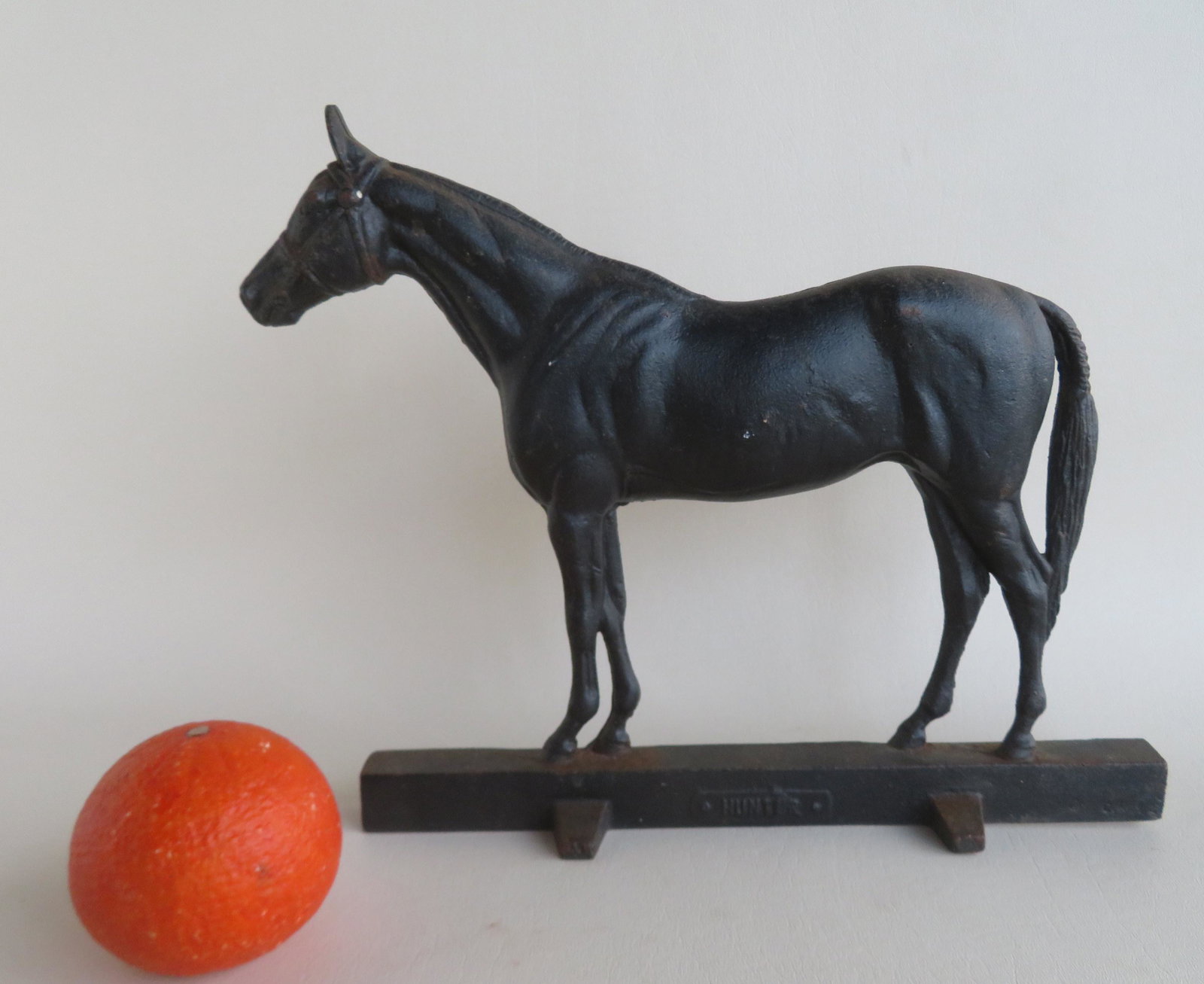 Cast iron standing horse door stop in original black: Cast iron standing horse door stop in original black paint, signed Virginia Metal Crafters and dated 1949 - very good condition. 13" x 10 1/2"