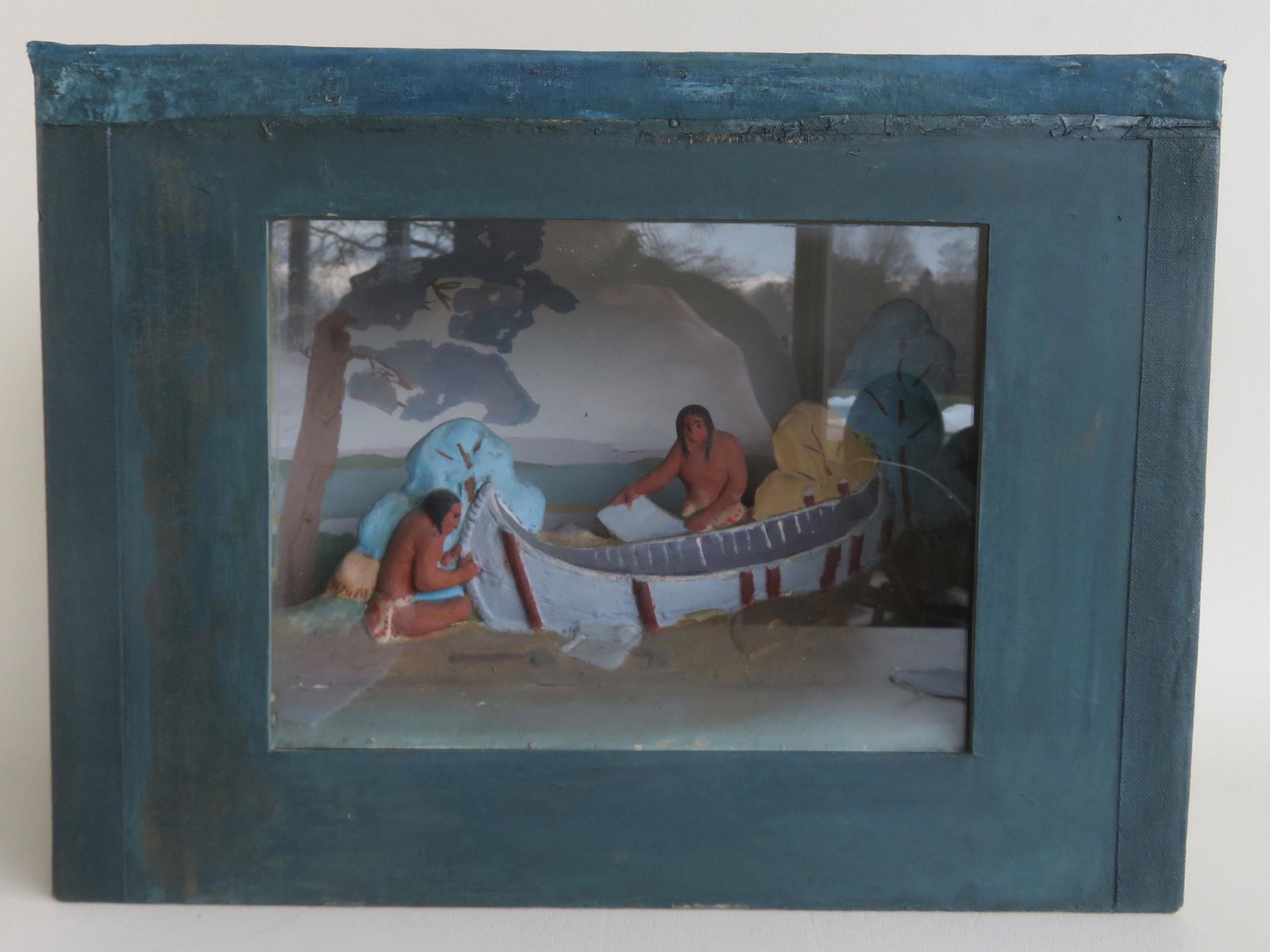 WPA diorama, 3 dimensional, depicting Native Americans: WPA diorama, 3 dimensional, depicting Native Americans building a canoe (plaster work - all hand painted) in foreground and a W/C landscape in backdrop. Paper label on top marked "Museum Extension Pro