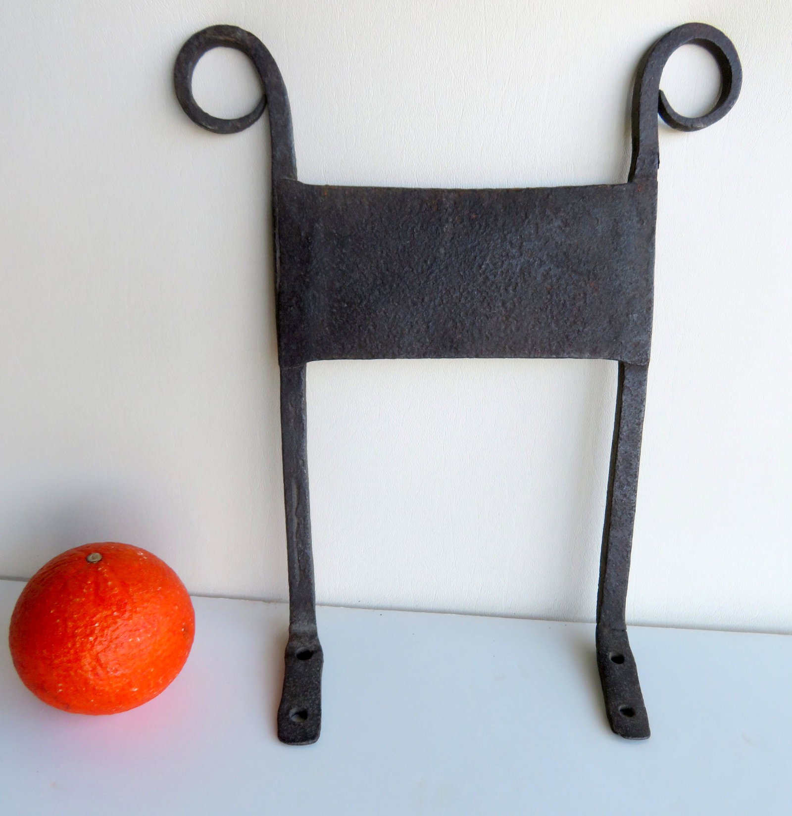 A hand forged iron boot scraper, 18th/19th century,: A hand forged iron boot scraper, 18th/19th century, good condition. 12 1/2"H x 10"W x 3" depth (feet). Provenance: From a Long Island NY country estate, name withheld by family.