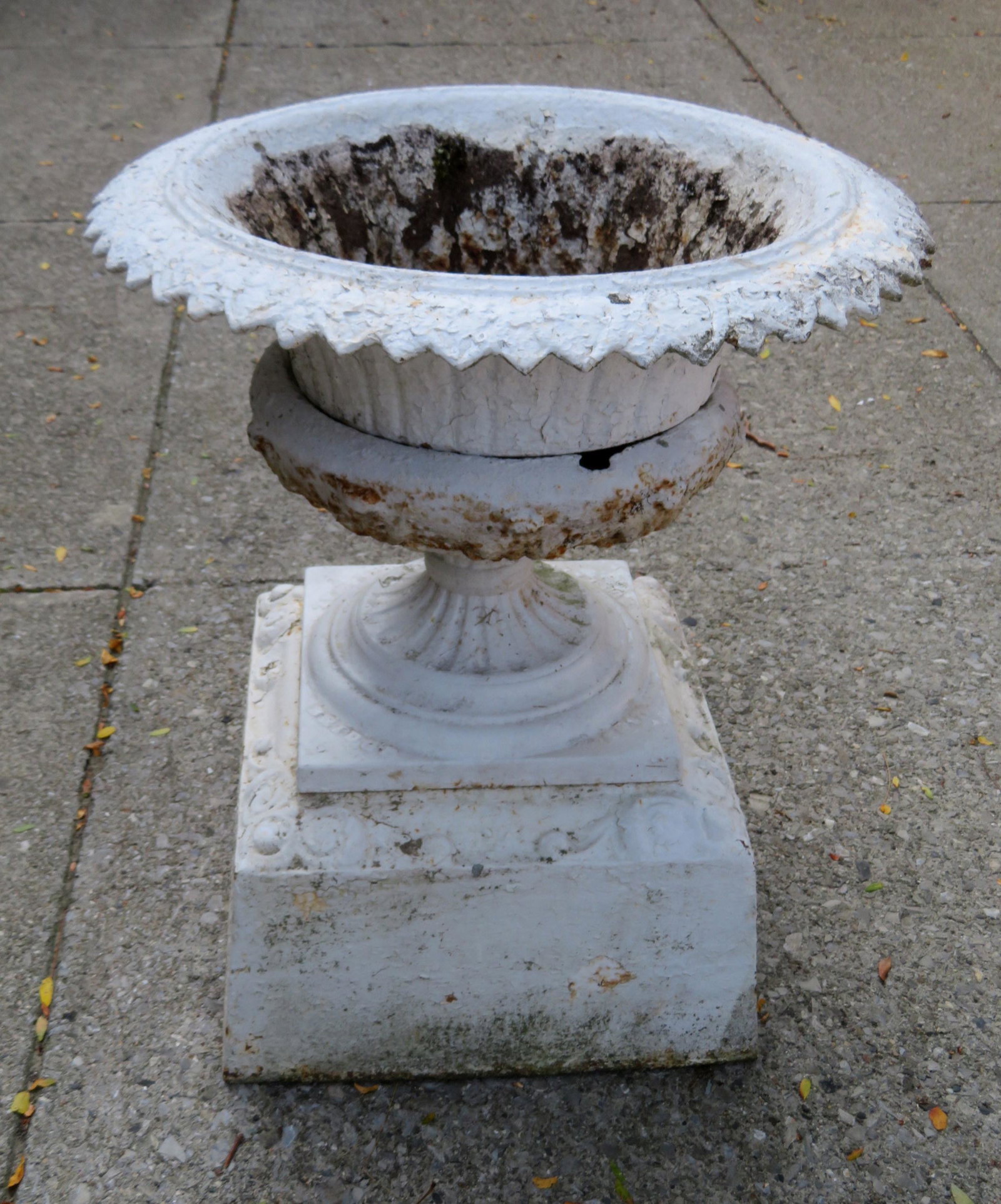 A 4 part Victorian cast iron garden urn signed C.E.: A 4 part Victorian cast iron garden urn signed C.E. Walbridge - Buffalo NY - 22"Dia. X 24"H. The drainage basin under the top has some rust and losses only noticeable on interior (see photos), otherwi