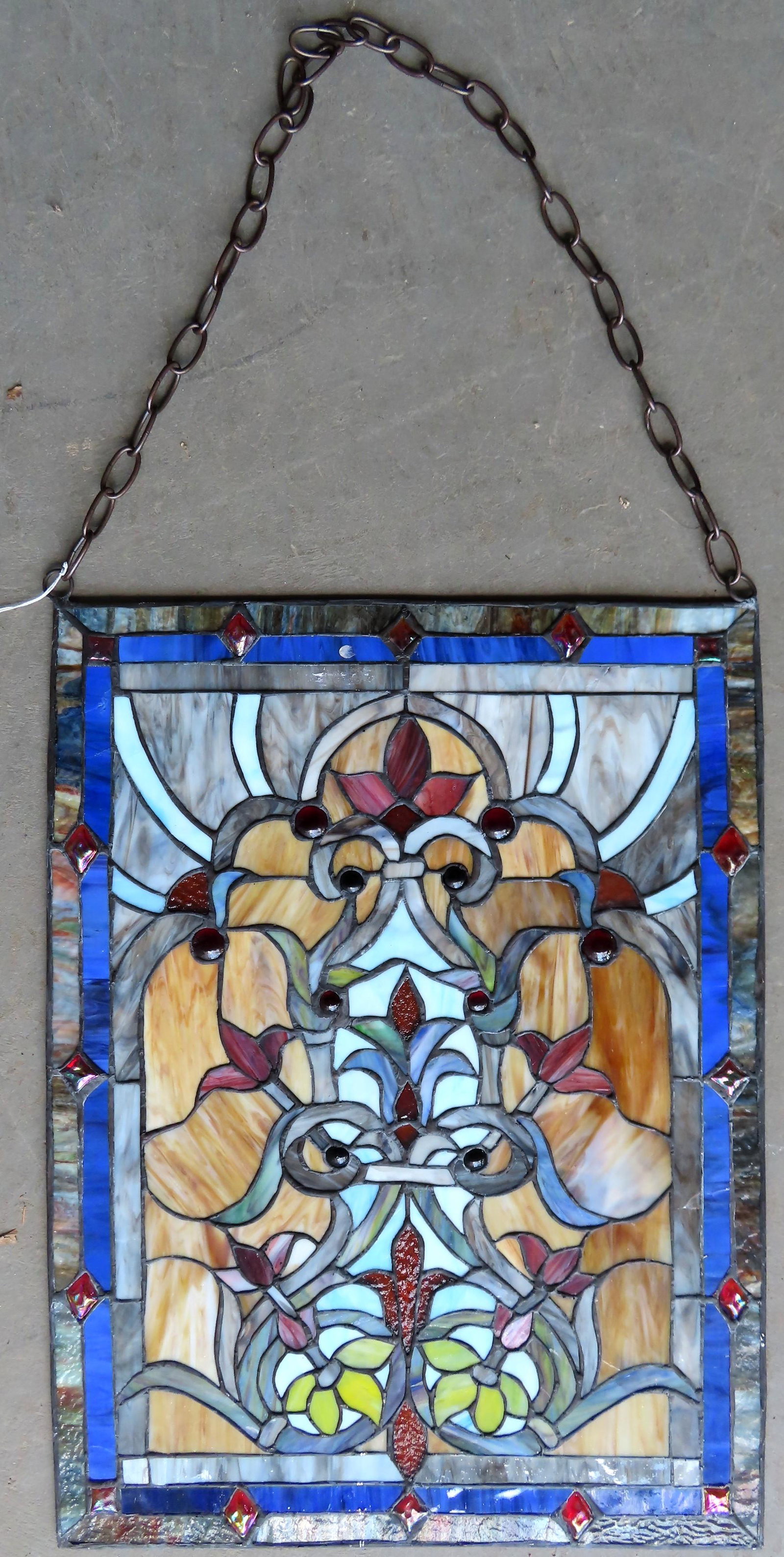 A beautiful Art Deco style stained and leaded glass: A beautiful Art Deco style stained and leaded glass window, out of window frame, circa 1950. Very good condition. 19 1/4" x 26".