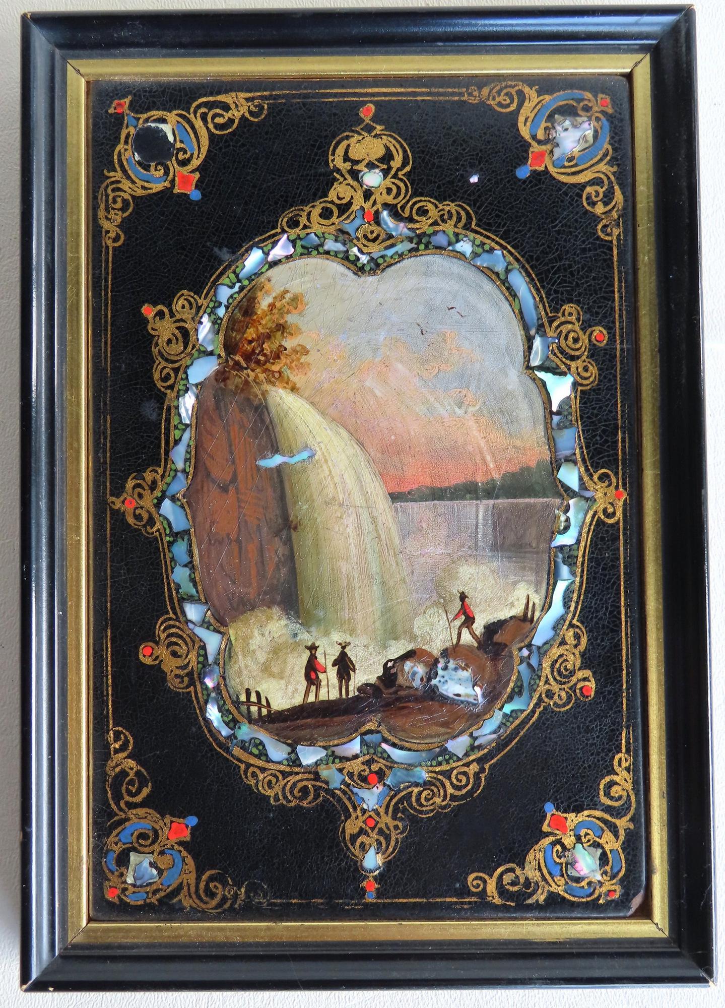 Small framed O/B Image of Niagara Falls with figures: Small framed O/B Image of Niagara Falls with figures standing on cliff overlooking the falls and river - paper mache and mother of pearl border, 19th century, very good condition. Measures 6" x 8 1/2"