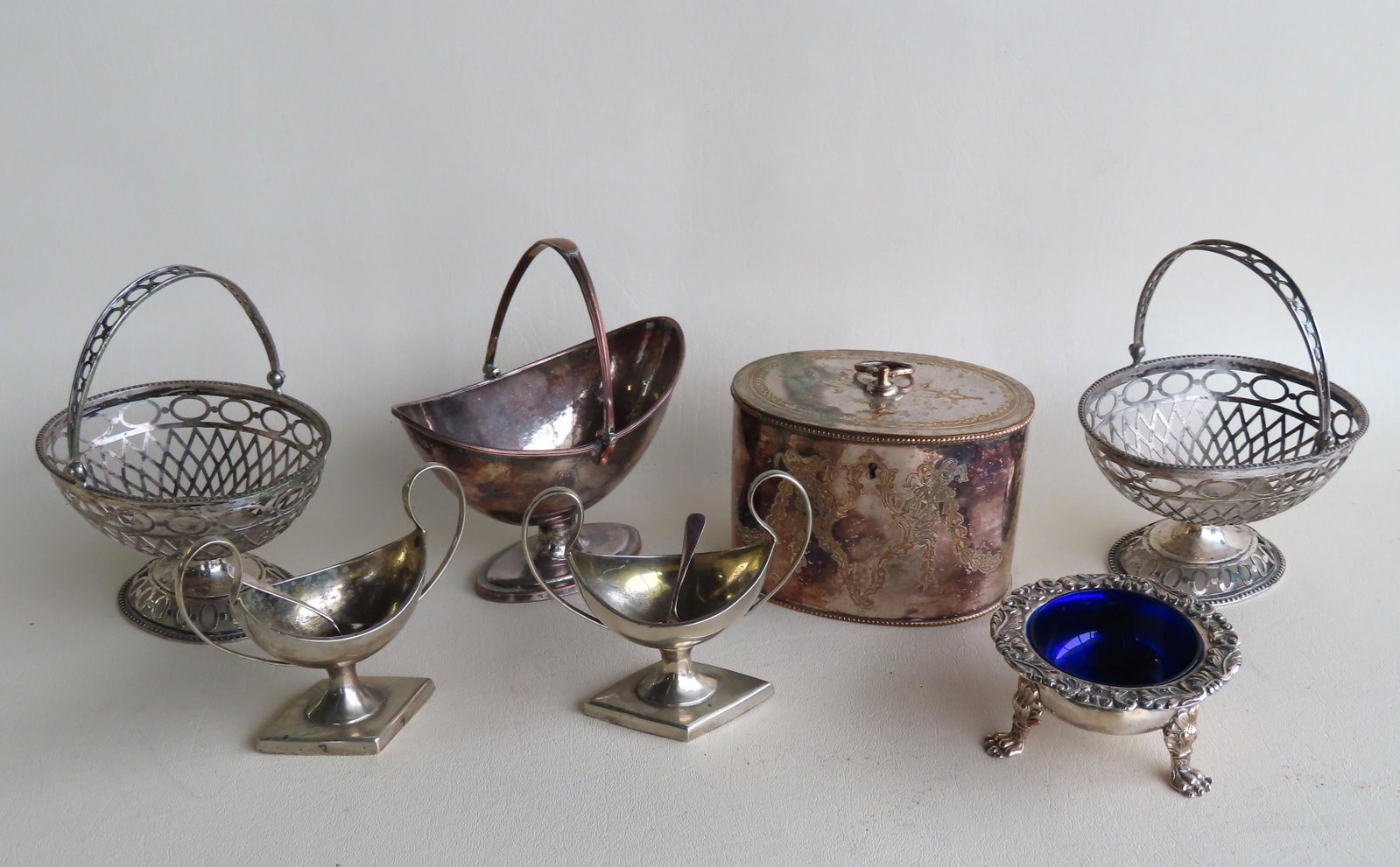 Grouping of early silver including salts, 2 sterling: Grouping of early silver including salts, 2 sterling salt spoons, an engraved Sheffield tea caddy with original lock - 4 3/4"W x 3 12/"D x 3 3/8"H, 2 small matching hand made reticulated serving bowls