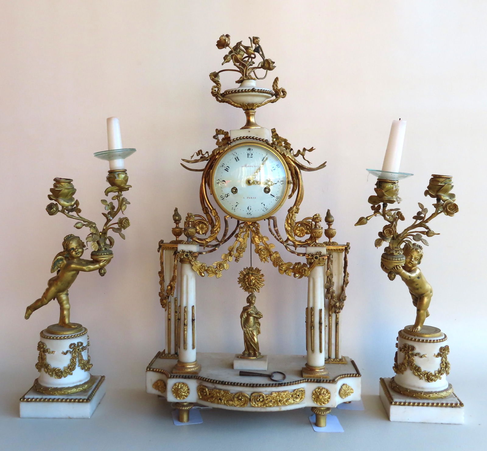 Charles-Guillaume ManiÃ¨re, active 1778-1812. An ornate: Charles-Guillaume ManiÃ¨re, active 1778-1812. An ornate French ManiÃ¨re 3 piece marble & gilt bronze garniture set, circa 1800-1810. Consisting of a marble mantle clock decorated with a bronze urn