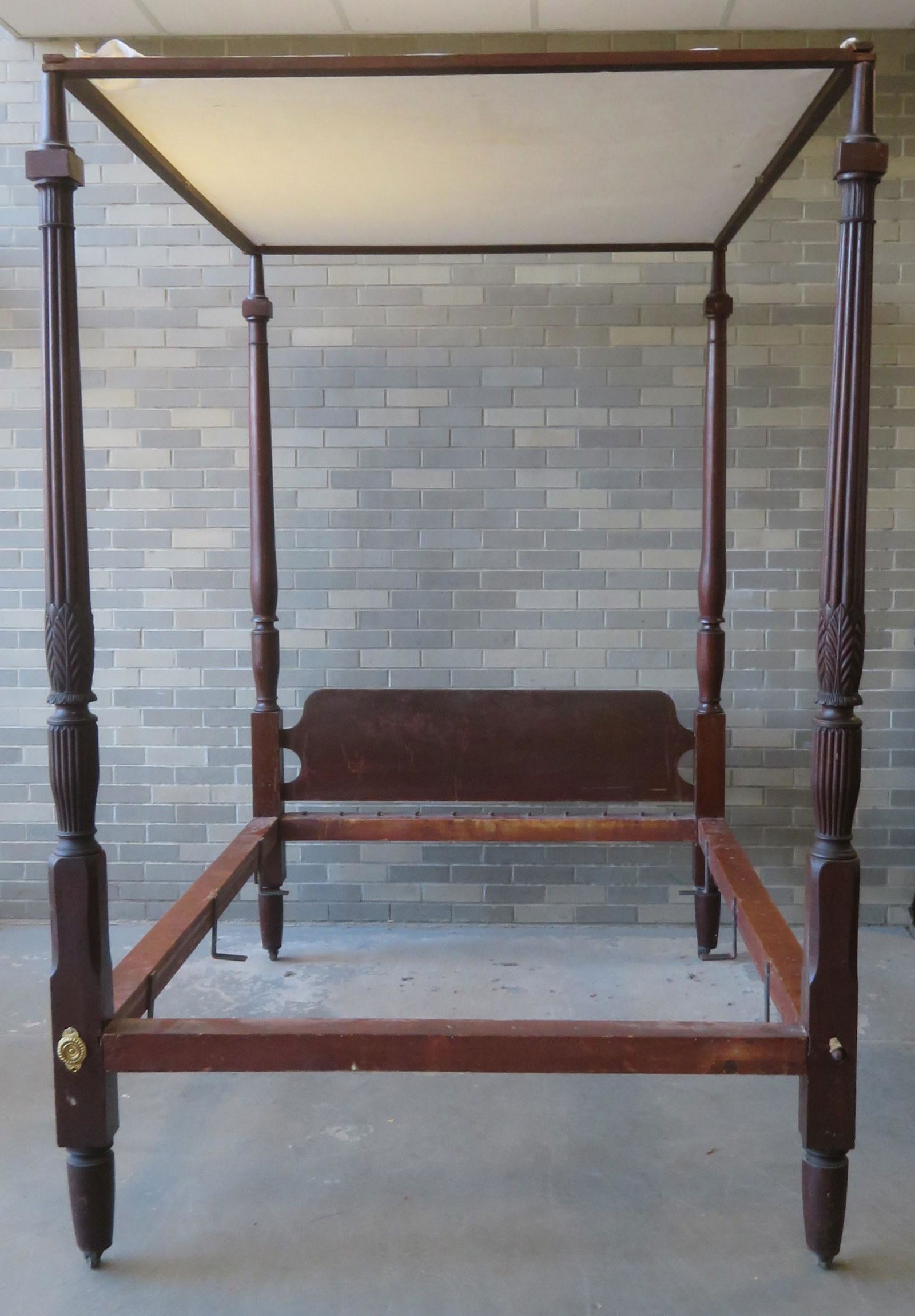 Good Sheraton mahogany tester bed. The headboard with: Good Sheraton mahogany tester bed. The headboard with simple turned columns, and the footboard with acanthus and reeded posts. Circa 1810-20. Small chip on turnings near top of 1 post, missing most of