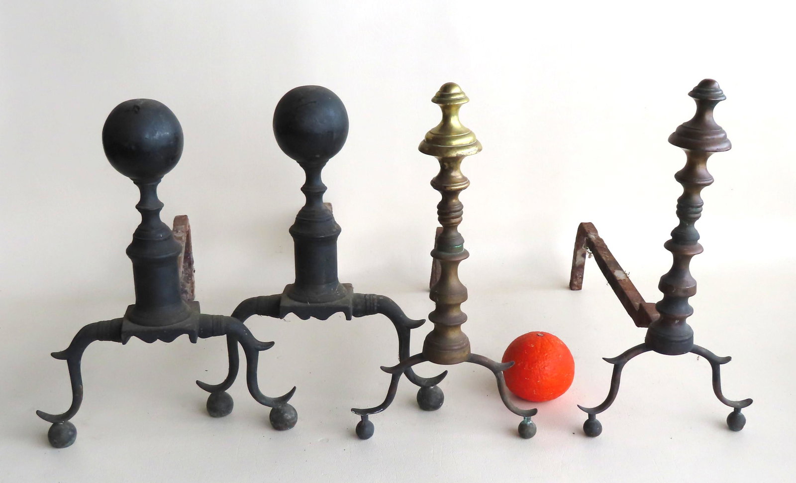 Two pair of good Chippendale brass andirons, late 18th: Two pair of good Chippendale brass andirons, late 18th to early 19th century. The first with ball tops on shaped plinths - note the turnings on leg terminals where they meet the plinth - very good ori