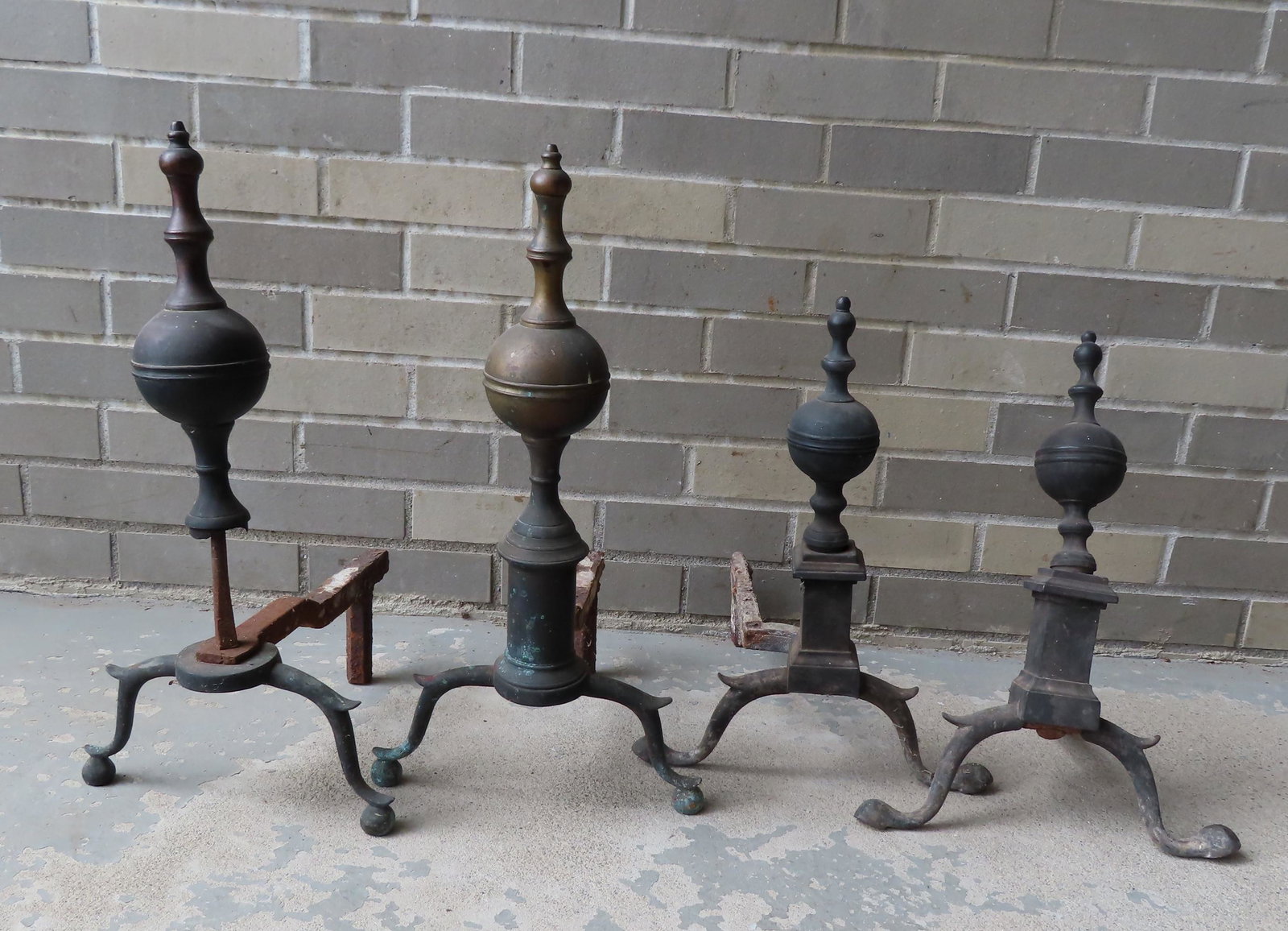 Two pair of Chippendale brass steeple andirons for: Two pair of Chippendale brass steeple andirons for parts or restoration - the largest 20 1/2"H x 10 1/2"W. Both late 18th to early 19th century. Provenance: From the estate of Zane Z. Studenroth Jr., 