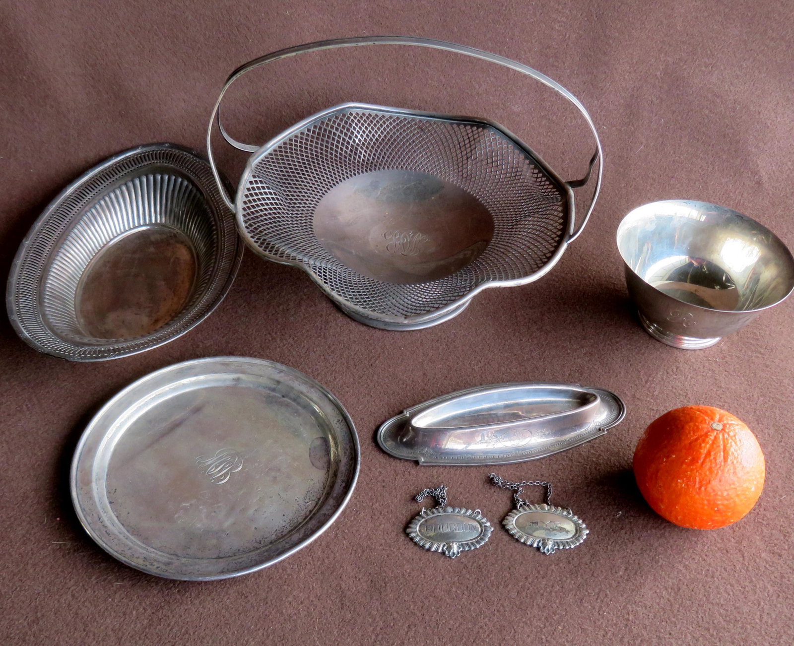Grouping of sterling silver collectibles including: Grouping of sterling silver collectibles including baskets, bowls, etc. (see photos) - note one bowl signed Cartier (Revere Reproduction). Total weight 28.7 troy ounces of pure silver.