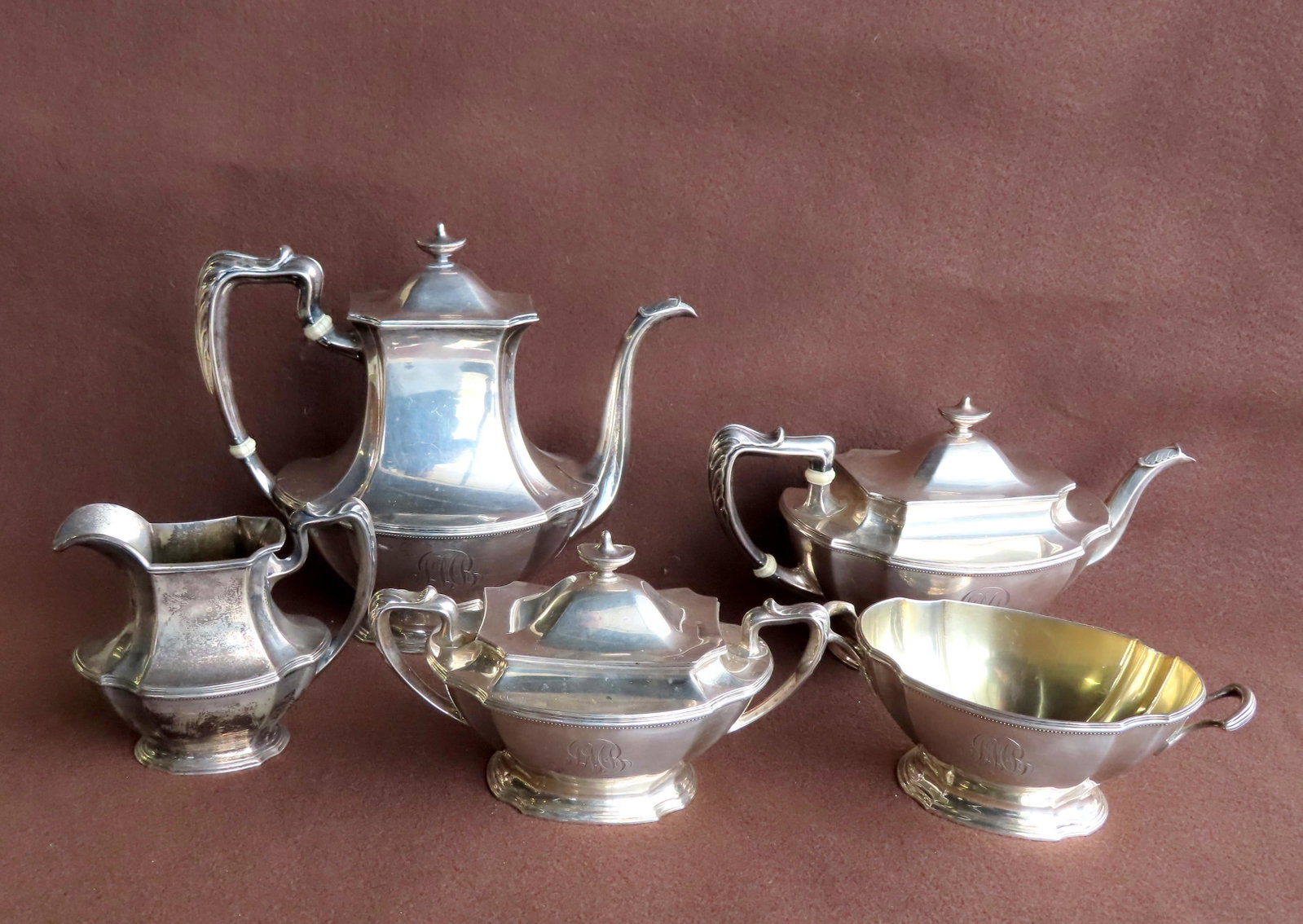 Gorham sterling silver 5 piece tea & coffee service: Gorham sterling silver 5 piece tea & coffee service including a tea pot, coffee pot, covered sugar bowl, creamer and waste bowl. The largest being the teapot 10 1/4"W x 8 3/4"H. Total weight 87.5 troy