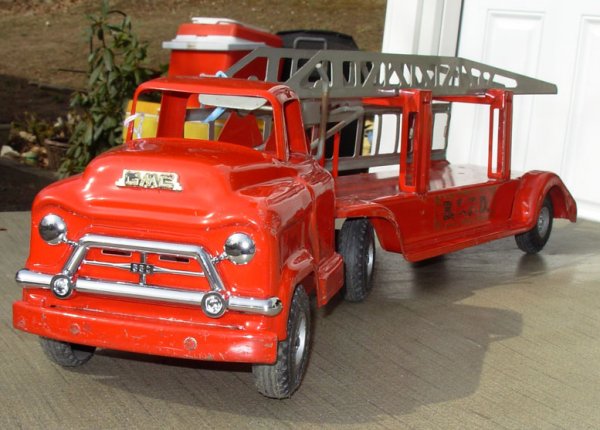 Buddy-L; GMC Aerial Fire Ladder tractor trailer exc: Buddy-L; GMC Aerial Fire Ladder tractor trailer excel cond, missing 1 ladder