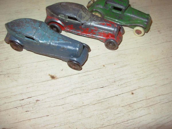Barclay, Lincoln, Kansas Toy, C.A.W.? Slush, Two 3 : Barclay, Lincoln, Kansas Toy, C.A.W.? Slush, Two 3 1/2' lg very good cond and green coupe very good cond