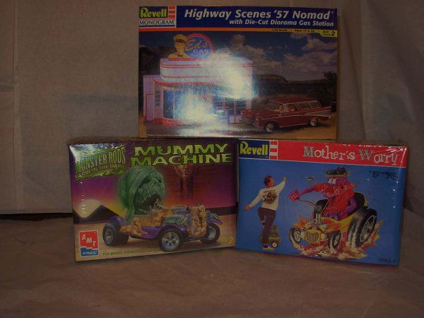 Model Kits: Revell, AMT & Hubley MIB: Hubley die cast kits, two 1930 Packard's; roadster & sport phaeton, complete MIB; PLUS Revell #85-7801: Highway Scenes 1957 Nomad w/ Gas Station [made in 1997]. Revell #76-23: Mother's Worry by Ed Rot