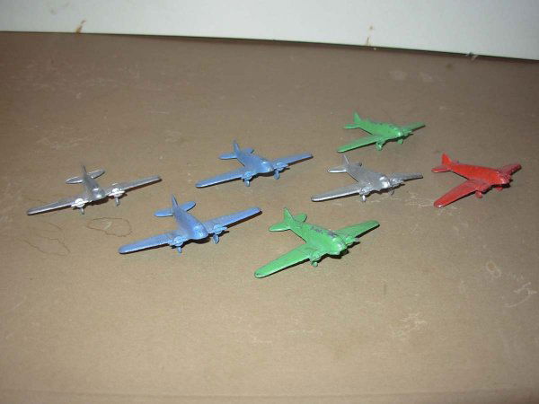 Slush / die cast planes, 7 pcs + 5 Lead Boats: Slush / die cast planes, 7 pieces 1 1/2" lg excl cond. PLUS Vintage Lead Boats; 5 pieces one 5" lg and the other four are 2 3/8' lg. Vey good cond
