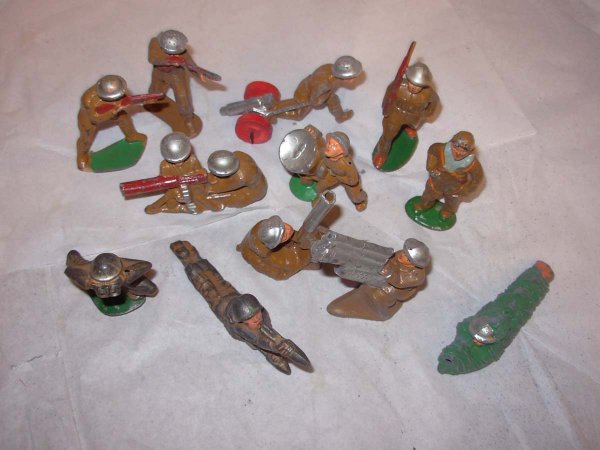 Dime Store Figures, hollow cast, 12 pieces 3" high: Dime Store Figures, hollow cast, 12 pieces 3" high; Camo Gunner (no gun), Anti-Aircraft Gunner, Mortar Loader, Solder w/Binoculars, 2 sitting Machine Gunners, Solder w/search light, Pilot, Solder pull