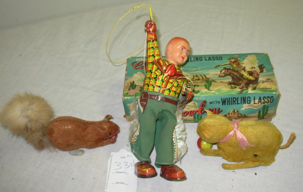 Two toys: Cowboy with whirling lasso (missing hat): Two toys: Cowboy with whirling lasso (missing hat) in original box by Linemar plus 2 Occupied Japan key wind toys - dog with ball and squirrel with nut
