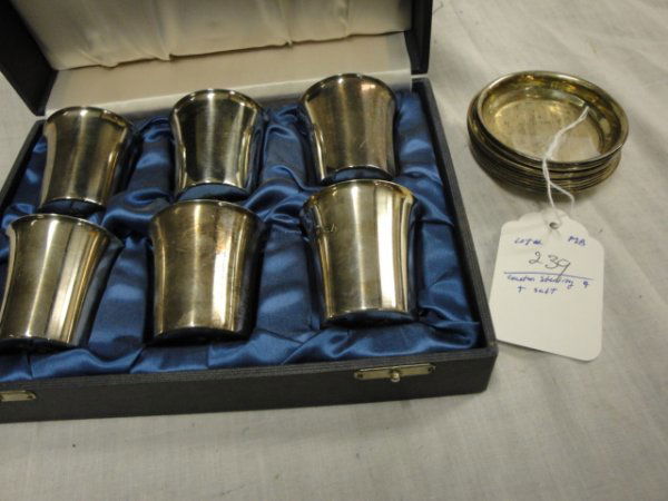 9 sterling coasters, 6 sterling cups, sterling sa: 9 sterling coasters, 6 sterling cups, sterling salt with blue lining and salt spoon