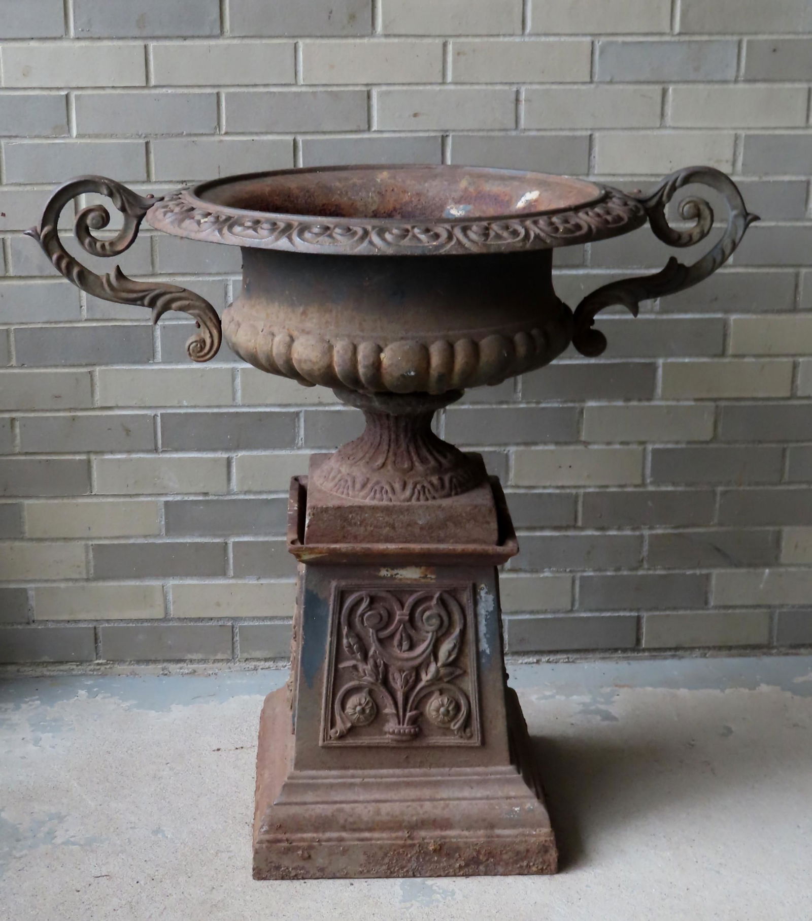 A cast iron 2 part garden urn with double handles. The (1 of 6)