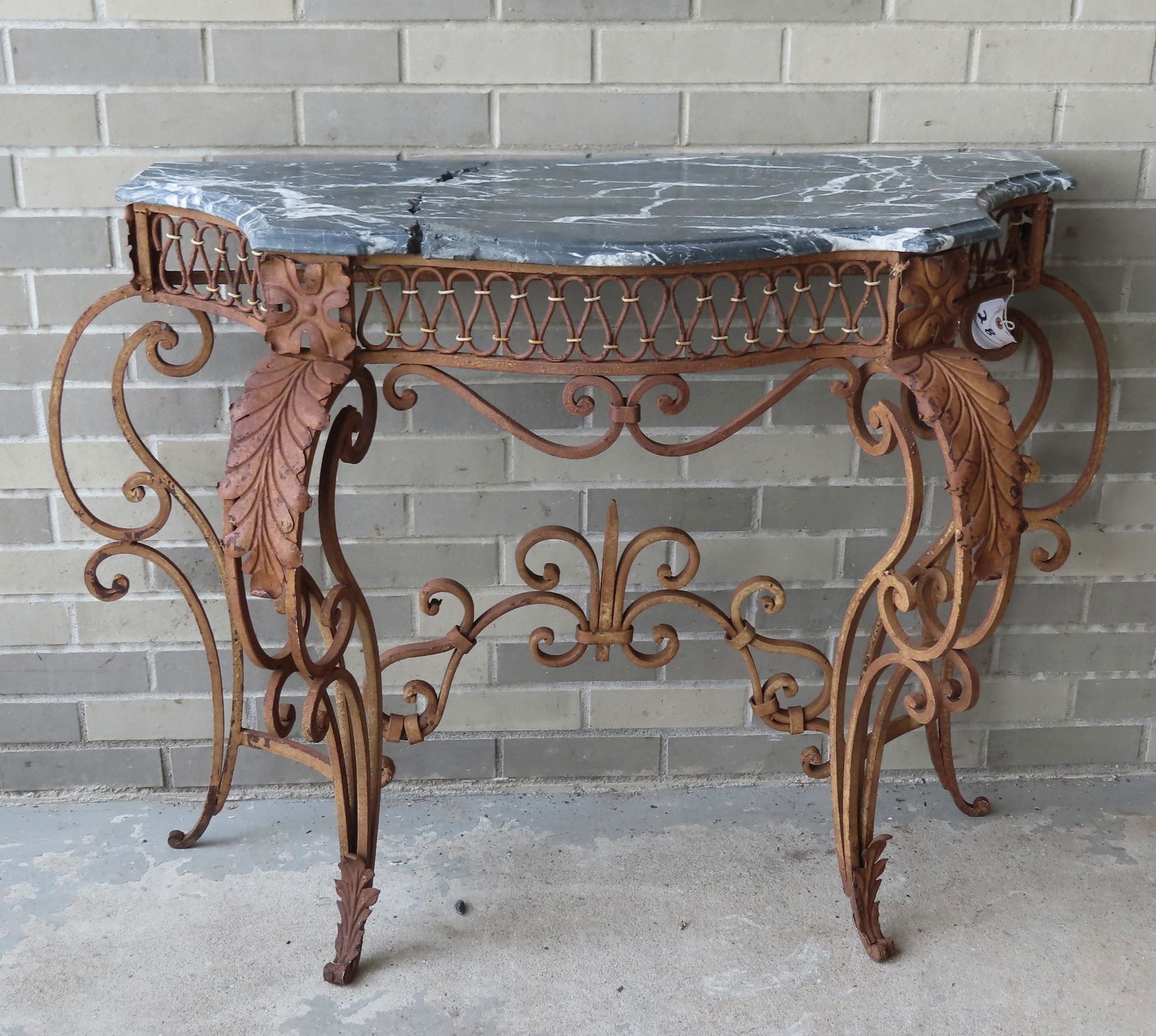 An ornate hand made wrought iron marble top console (1 of 4)