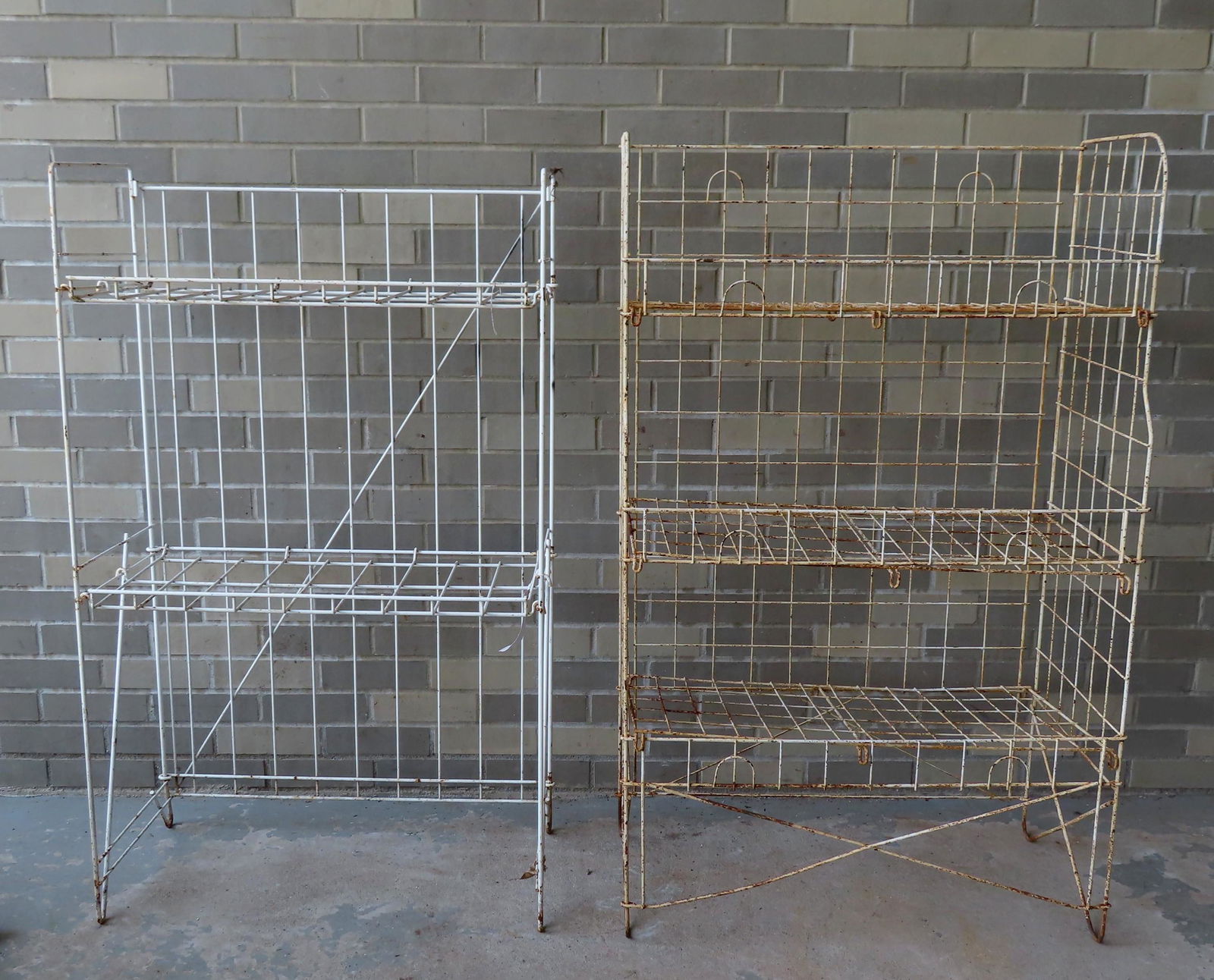 Two folding wire plant stands. The first with 2 shelves (1 of 1)