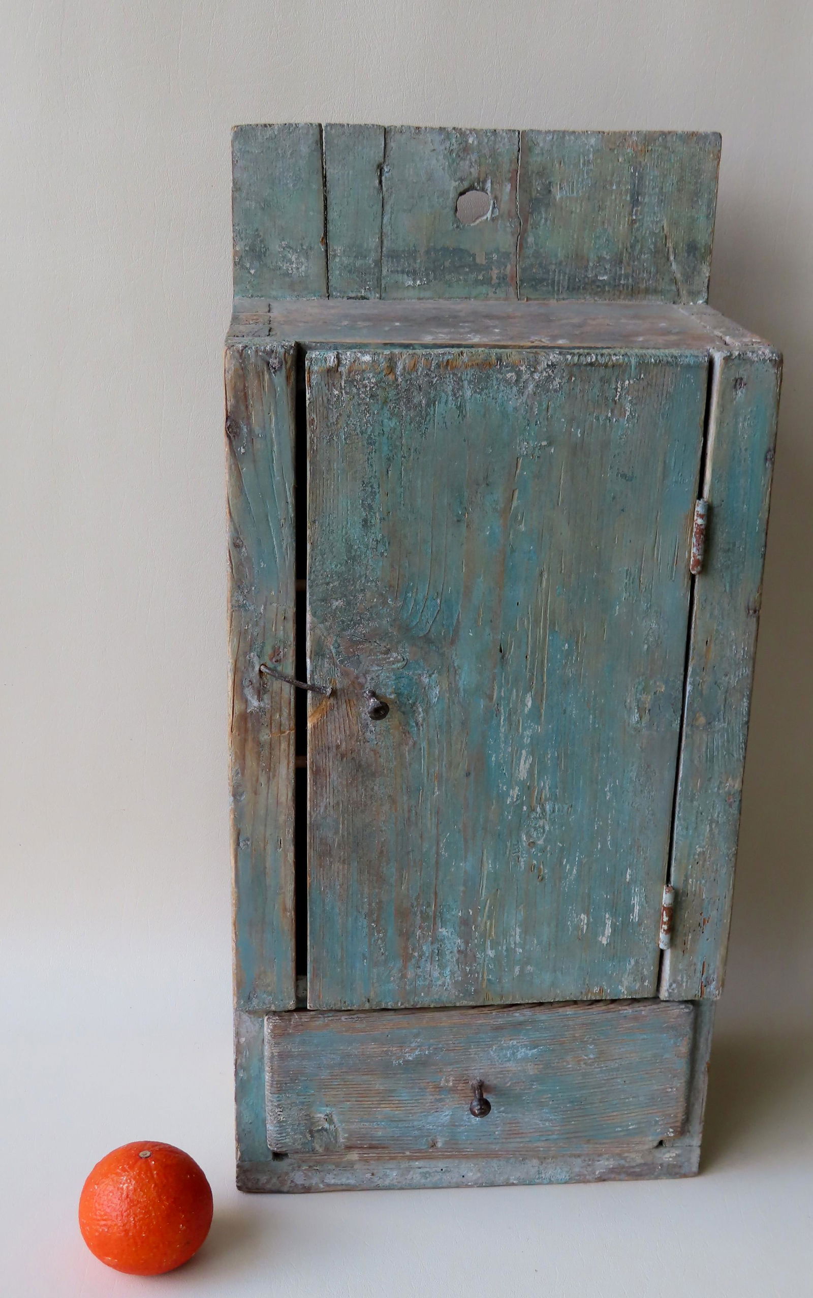 A primitive wall cupboard having a single door over 1 (1 of 5)