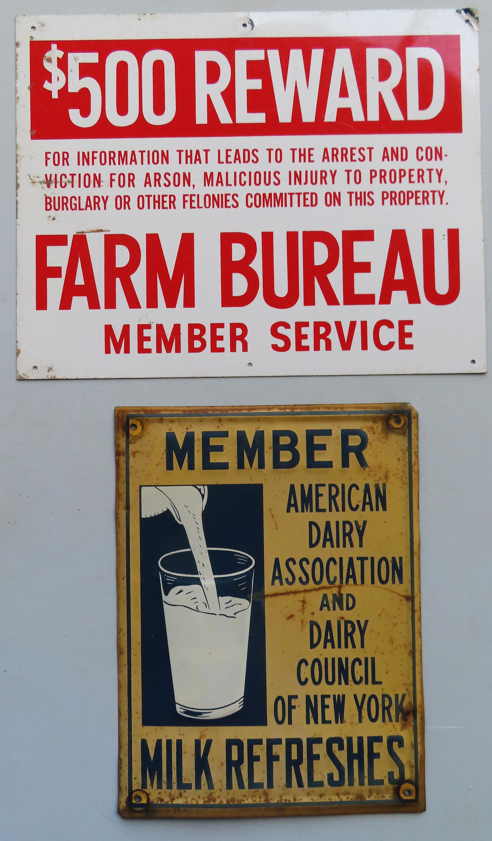 Two lithographed tin advertising signs. The first (1 of 5)