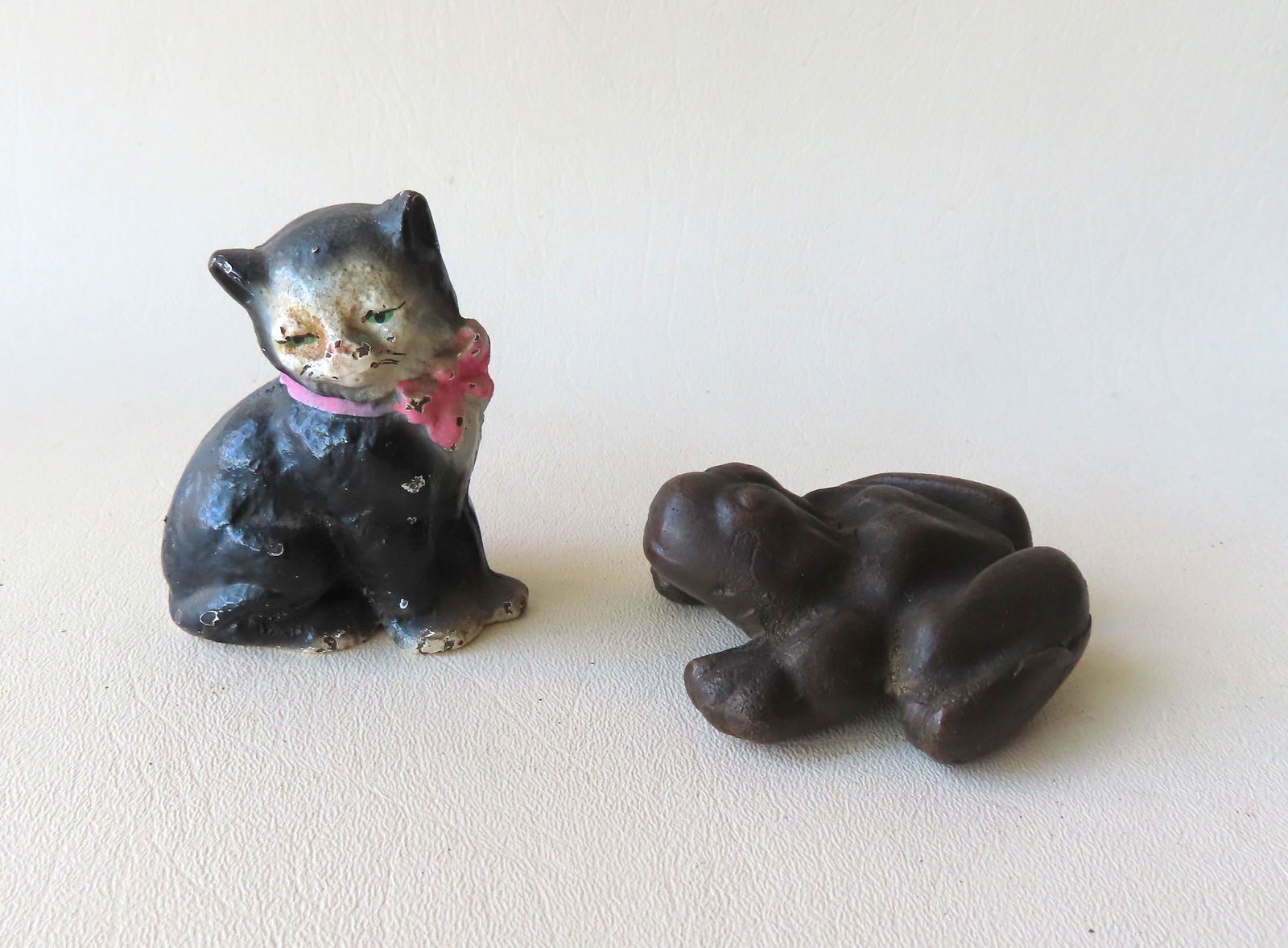 Two miniature solid cast iron paper weights in original (1 of 7)