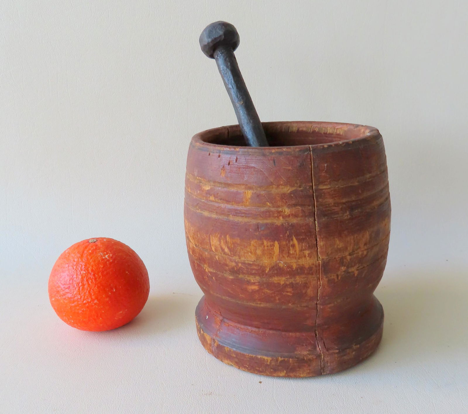 An early hand dug, barrel shaped mortar on a circular (1 of 5)