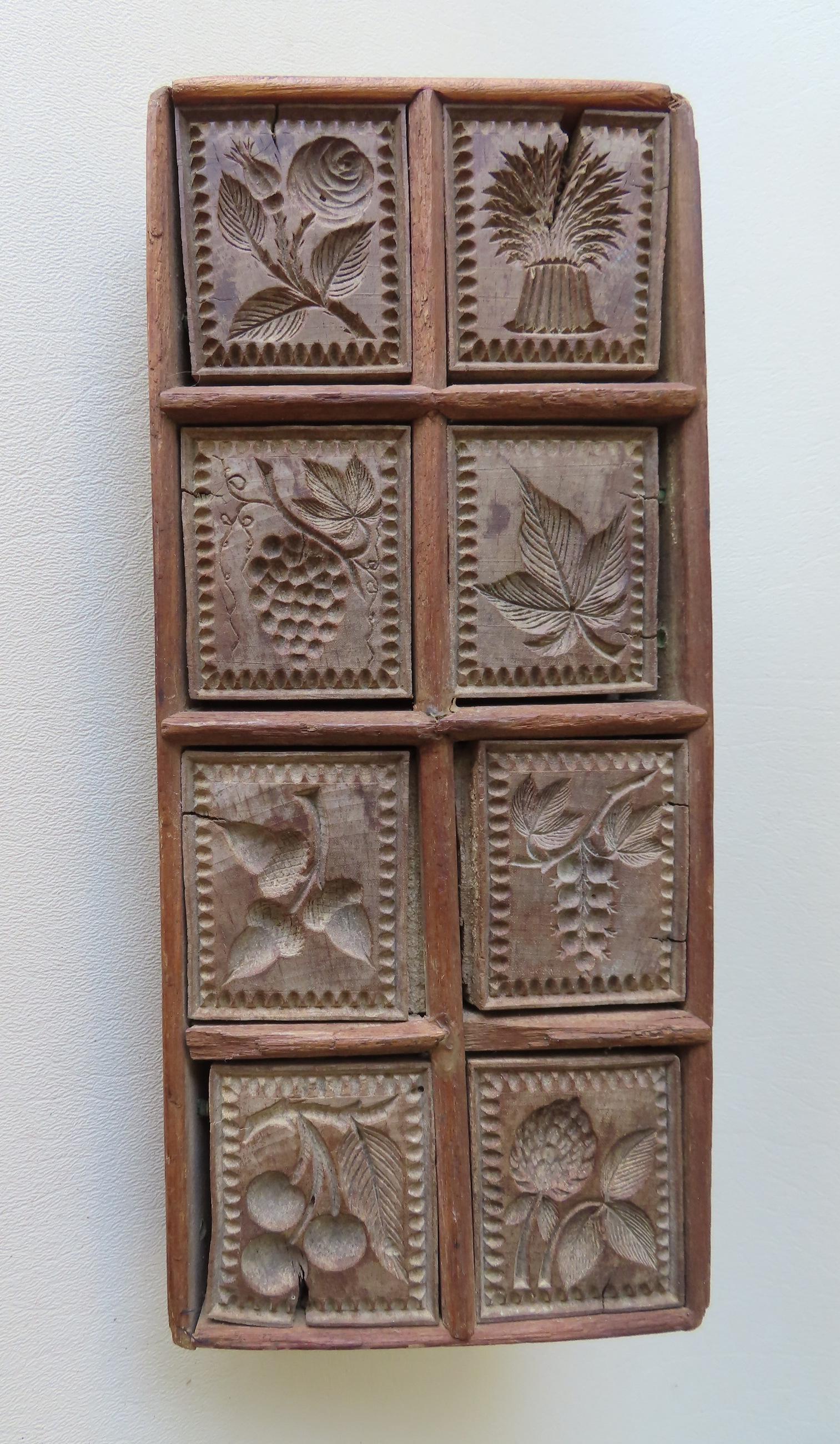 A set of 8 very detailed carved wooden butter stamps in (1 of 3)