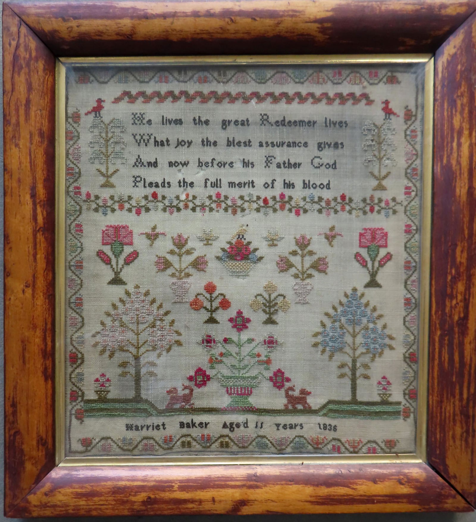 Poetic and pictorial sampler signed "Harriet Baker (1 of 3)