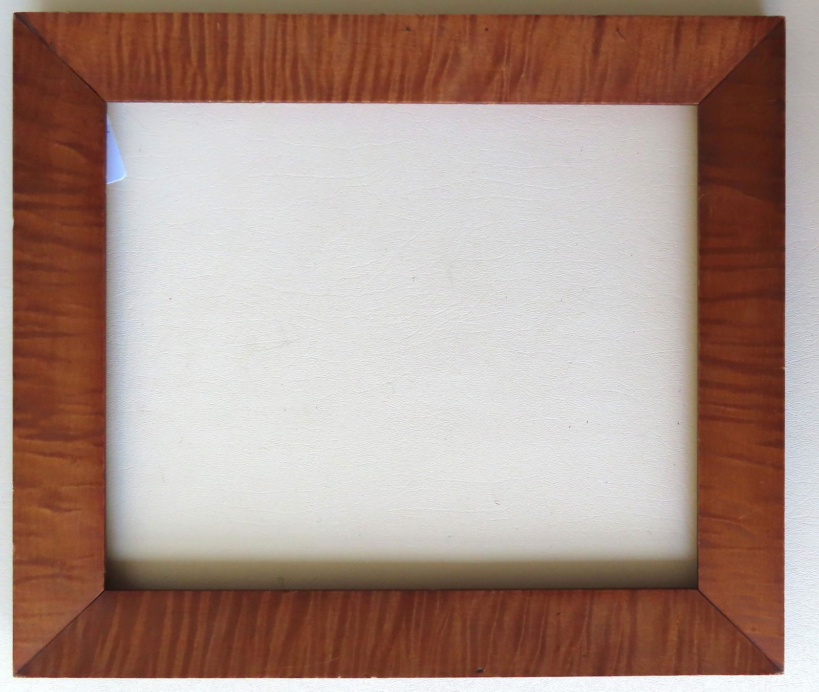 A tiger maple frame, mid 19th century. The opening 11 (1 of 3)