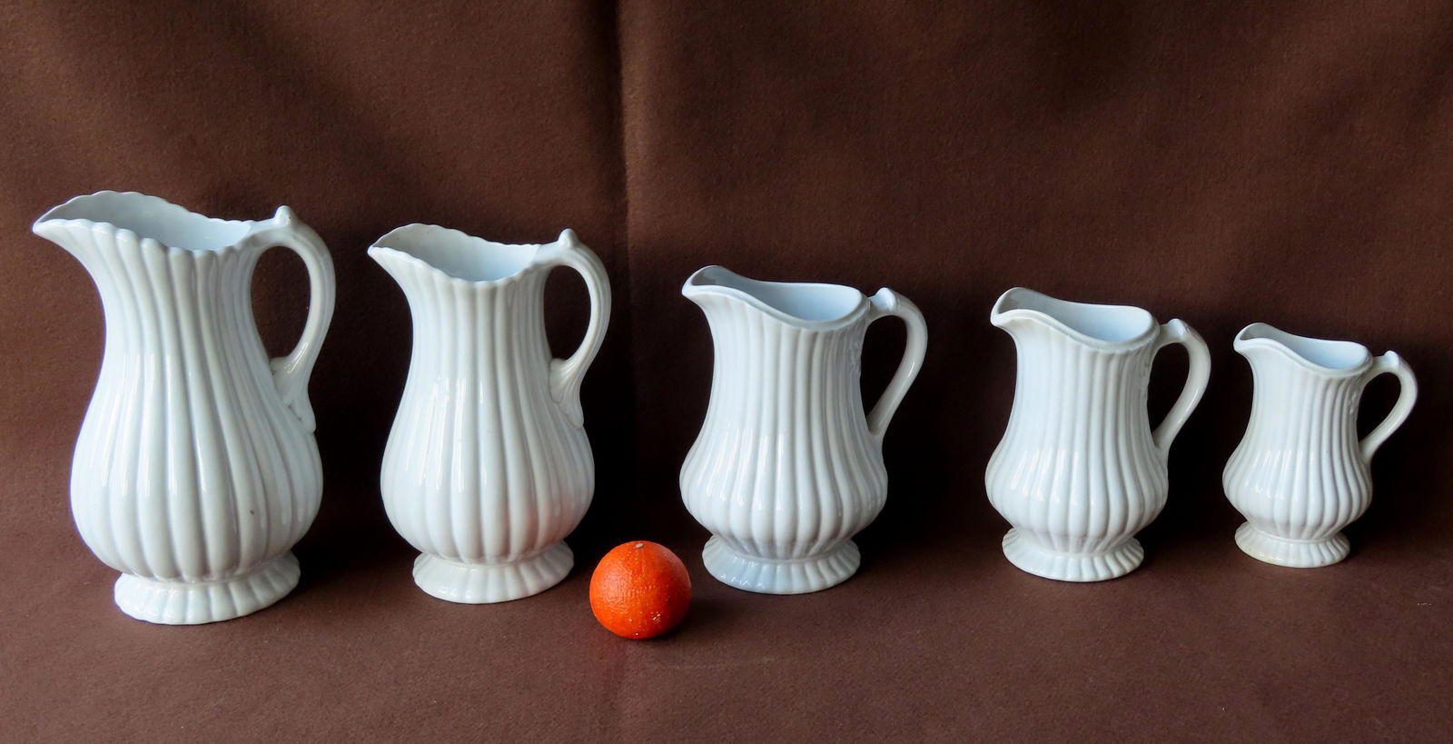Grouping of 5 Pankhurst ribbed pitchers in graduated (1 of 20)