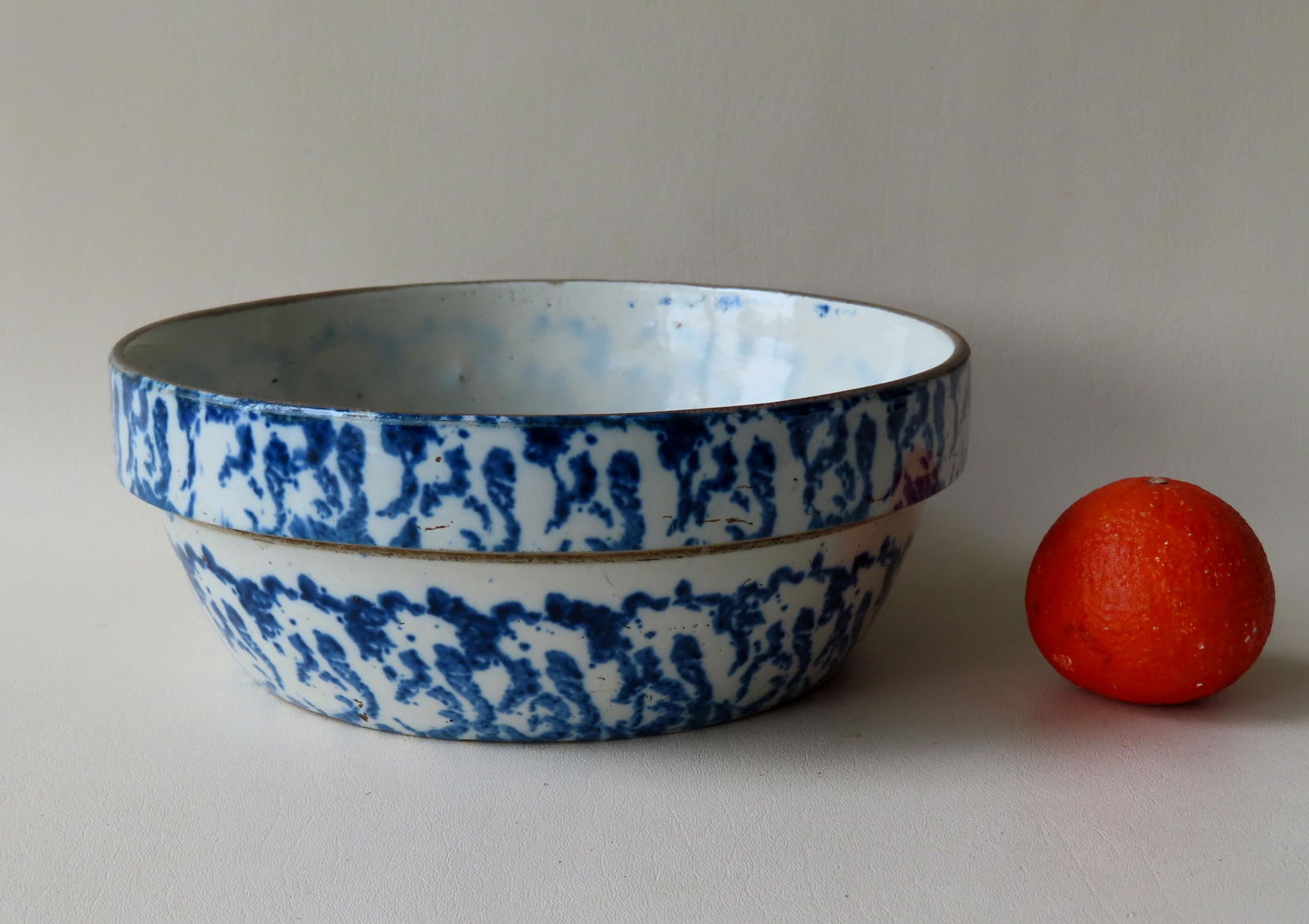 A dark blue & white spongeware milk bowl with wide (1 of 5)