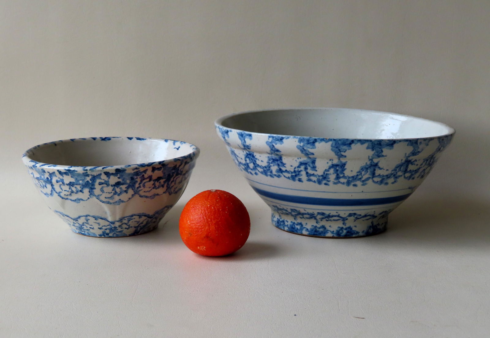 Two blue and white spongeware mixing bowls. The larger (1 of 9)