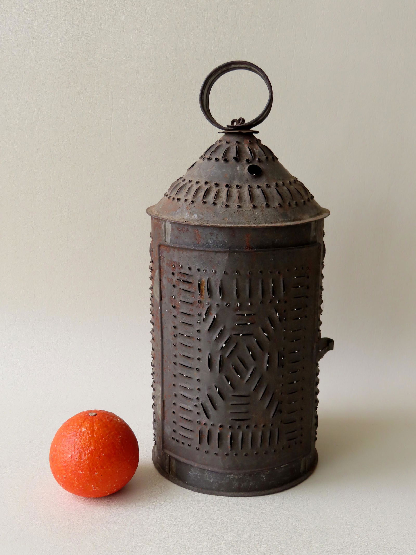 A cylindrical pierced tin candle lantern with circular (1 of 4)