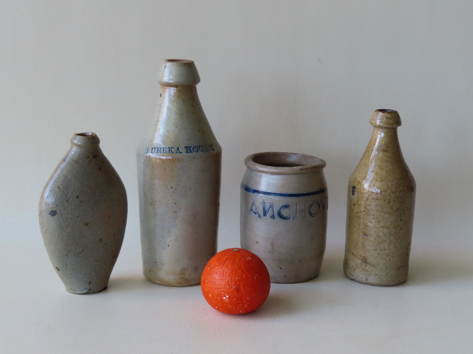 Four pieces of stoneware including: A small jar with (1 of 11)