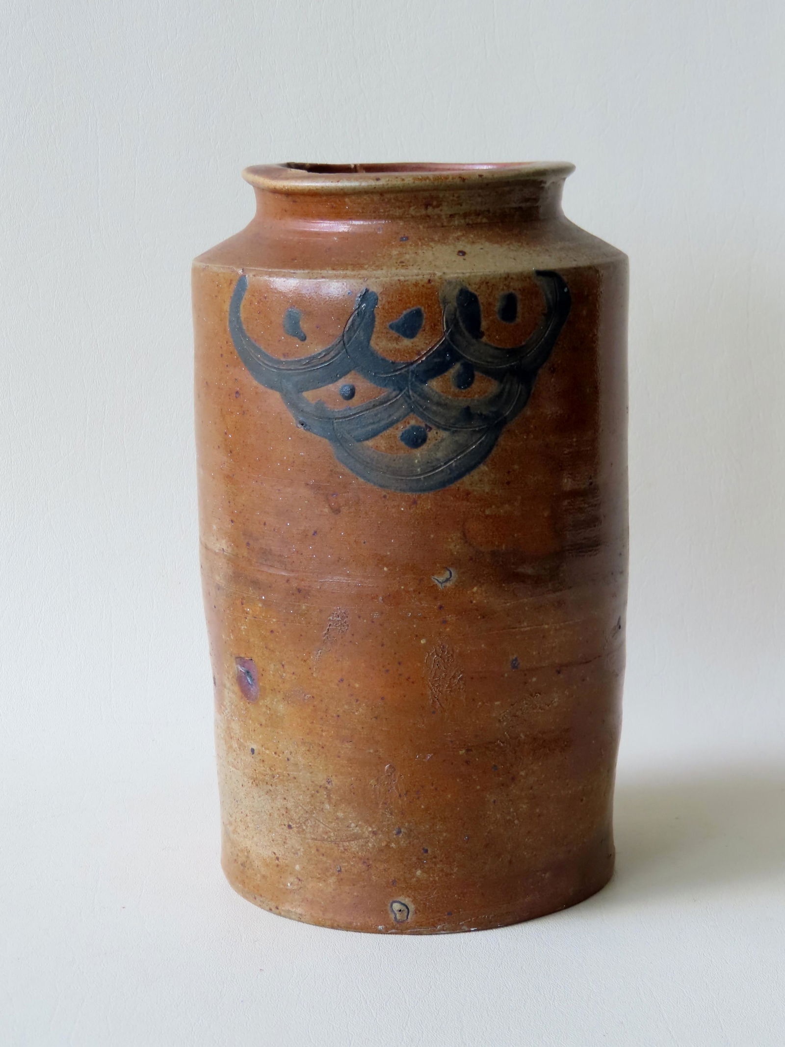 A large stoneware pantry jar decorated with symmetrical (1 of 8)