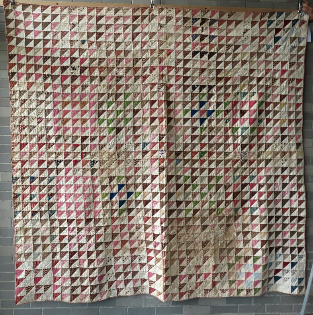 A signature patchwork quilt in the Flying Geese (1 of 18)