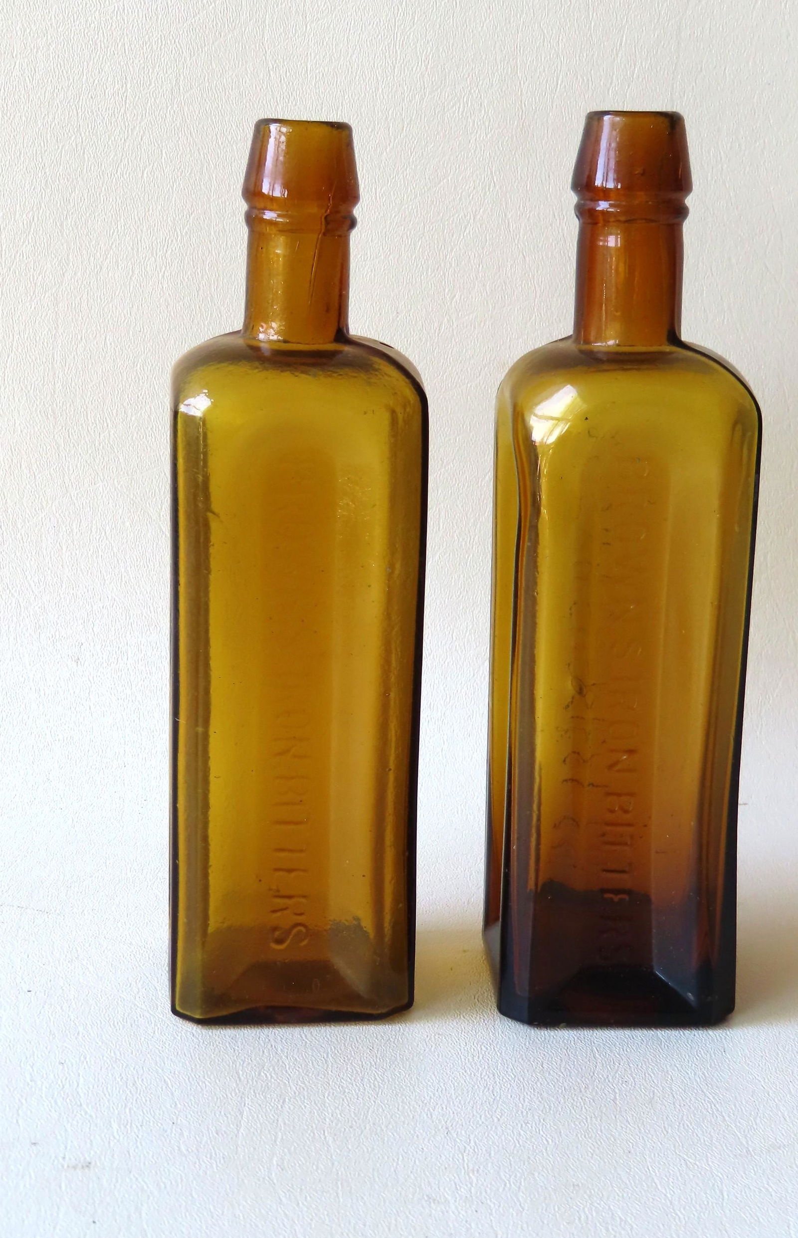 Two honey amber bitters bottle marked "Brown's Iron (1 of 7)