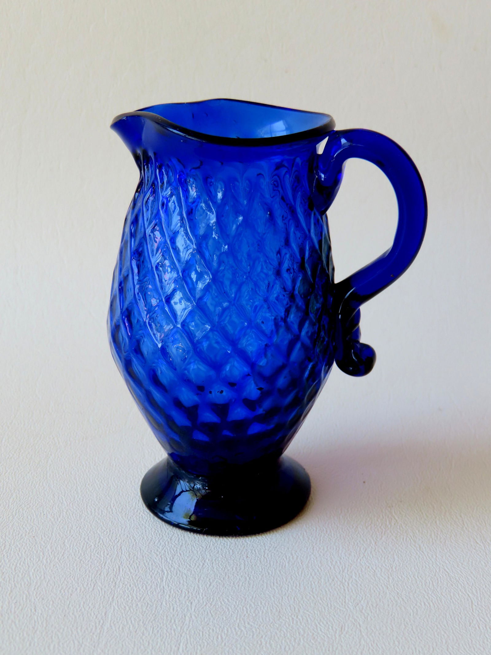 A pattern molded light cobalt blue creamer with applied (1 of 5)
